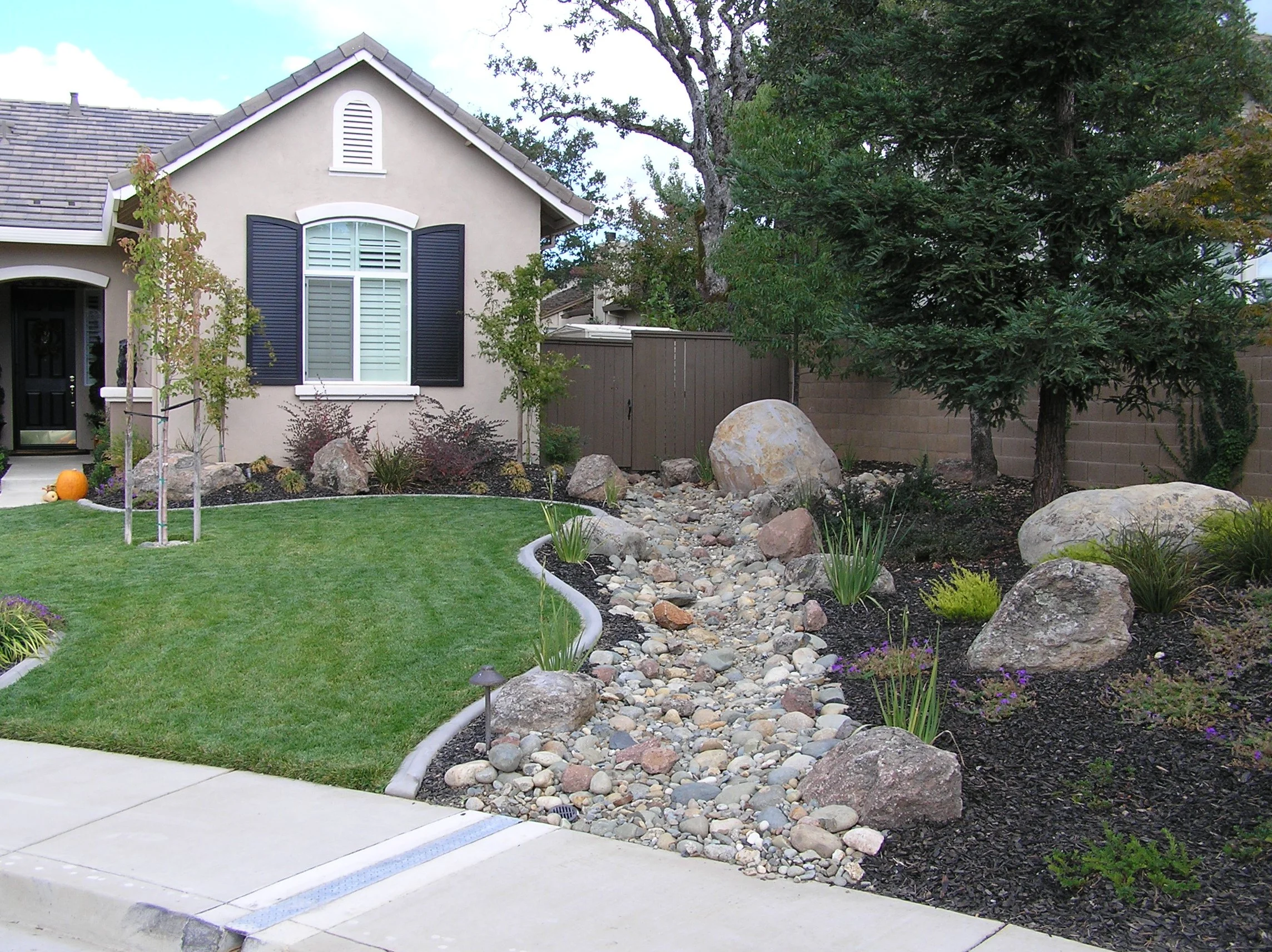boulder-landscape-grass-creek-bed.jpg