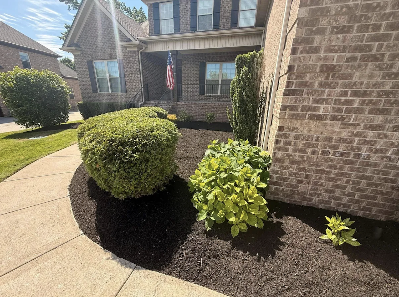 Shrub trimming and driveway landscape maintenance in Northern Kentucky
