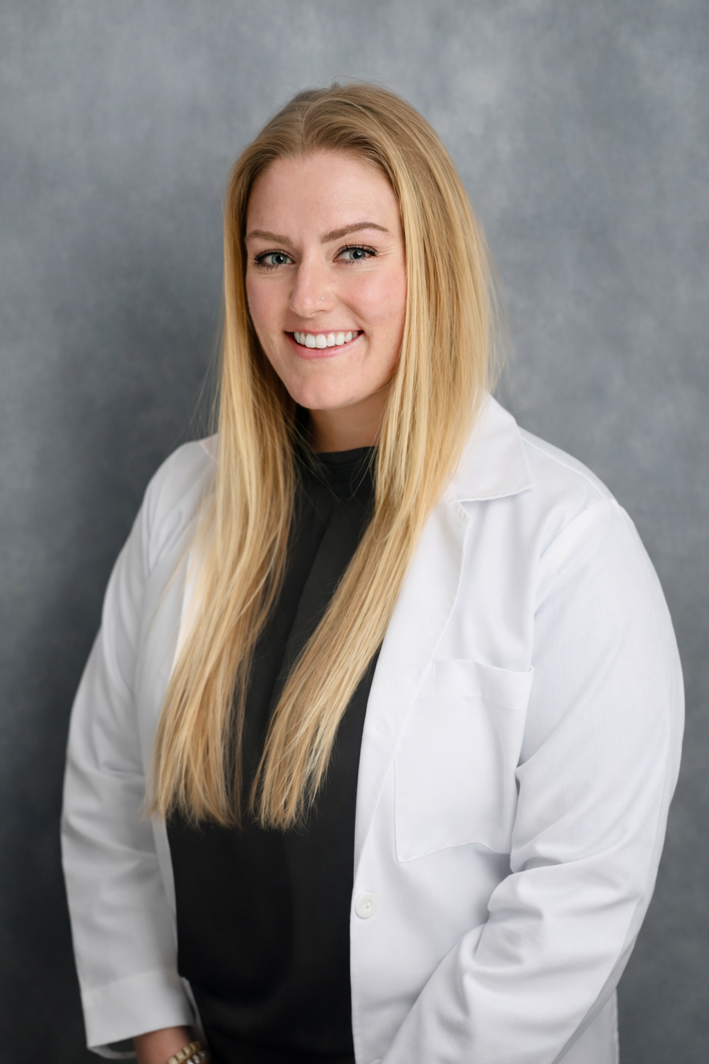 Kaycee, PA-C and co-founder of Inject Kalispell, aesthetic specialist leveraging her expertise for natural, un-frozen facial restoration.