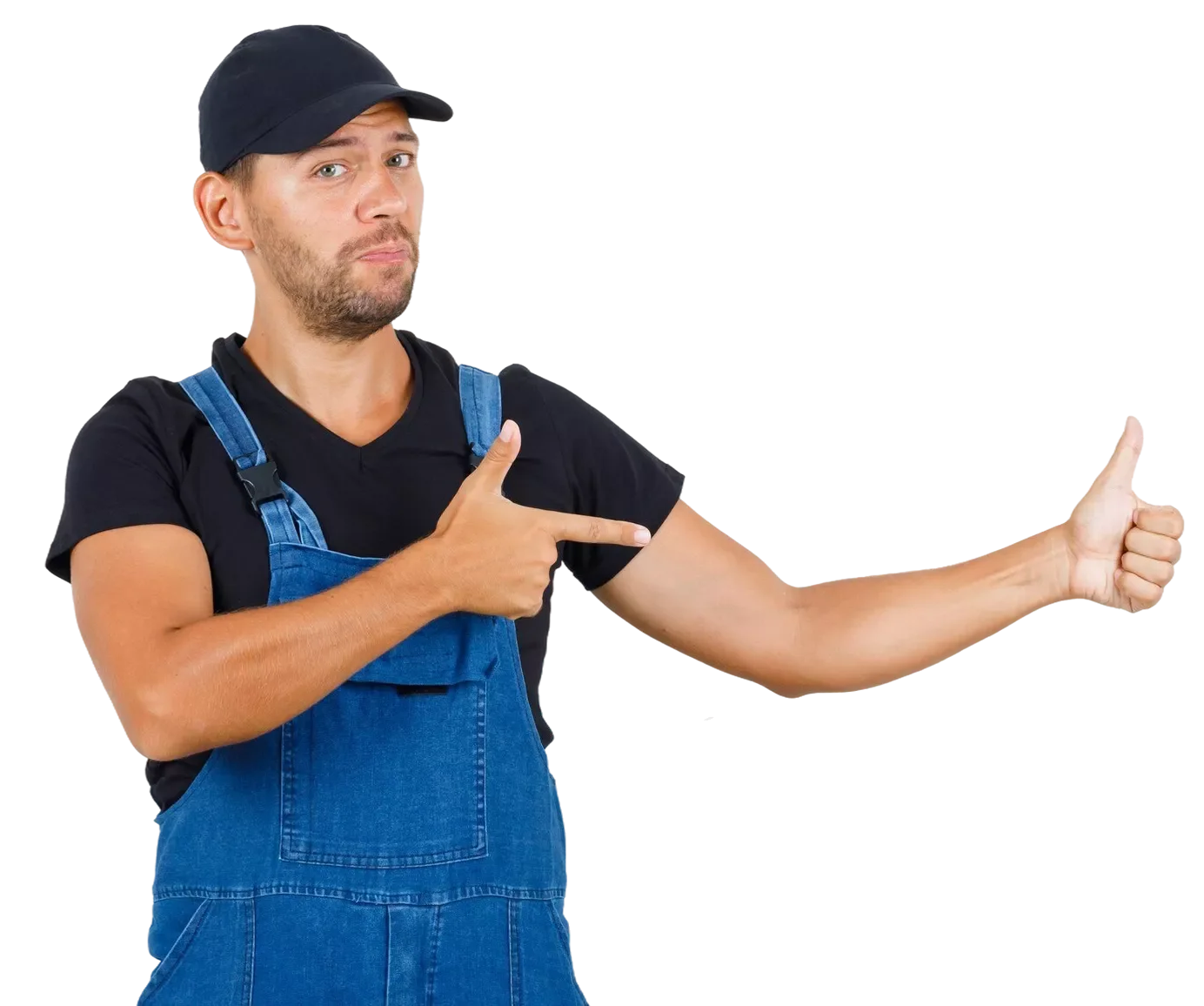 A man wearing a black cap, black T-shirt, and blue overalls is pointing to his right with his left hand and giving a thumbs-up with his right hand.