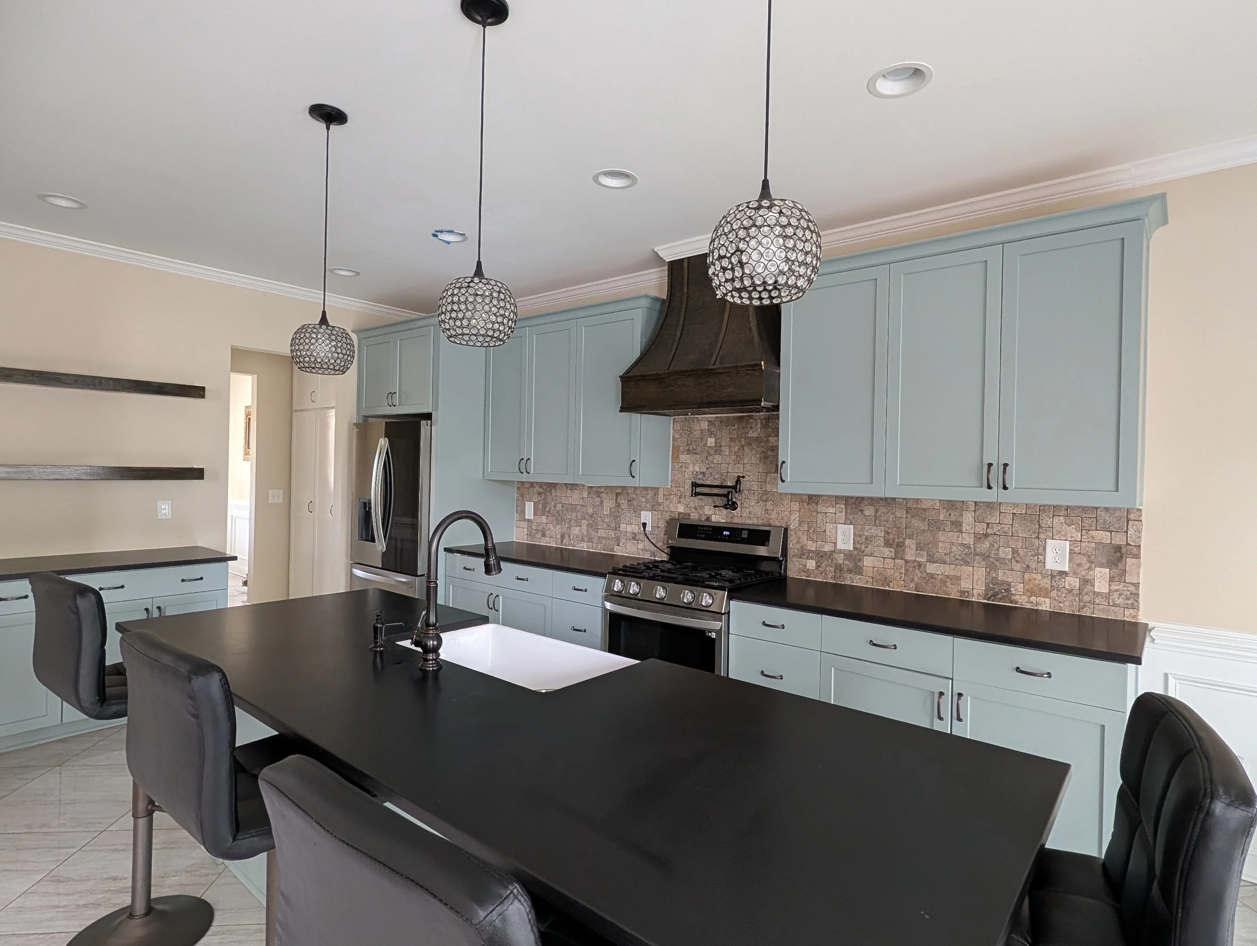 Spacious gourmet kitchen with large island and premium finishes