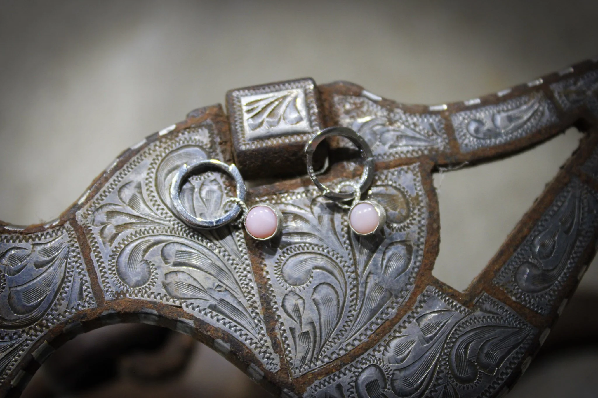 Huggies with pink conch dangle