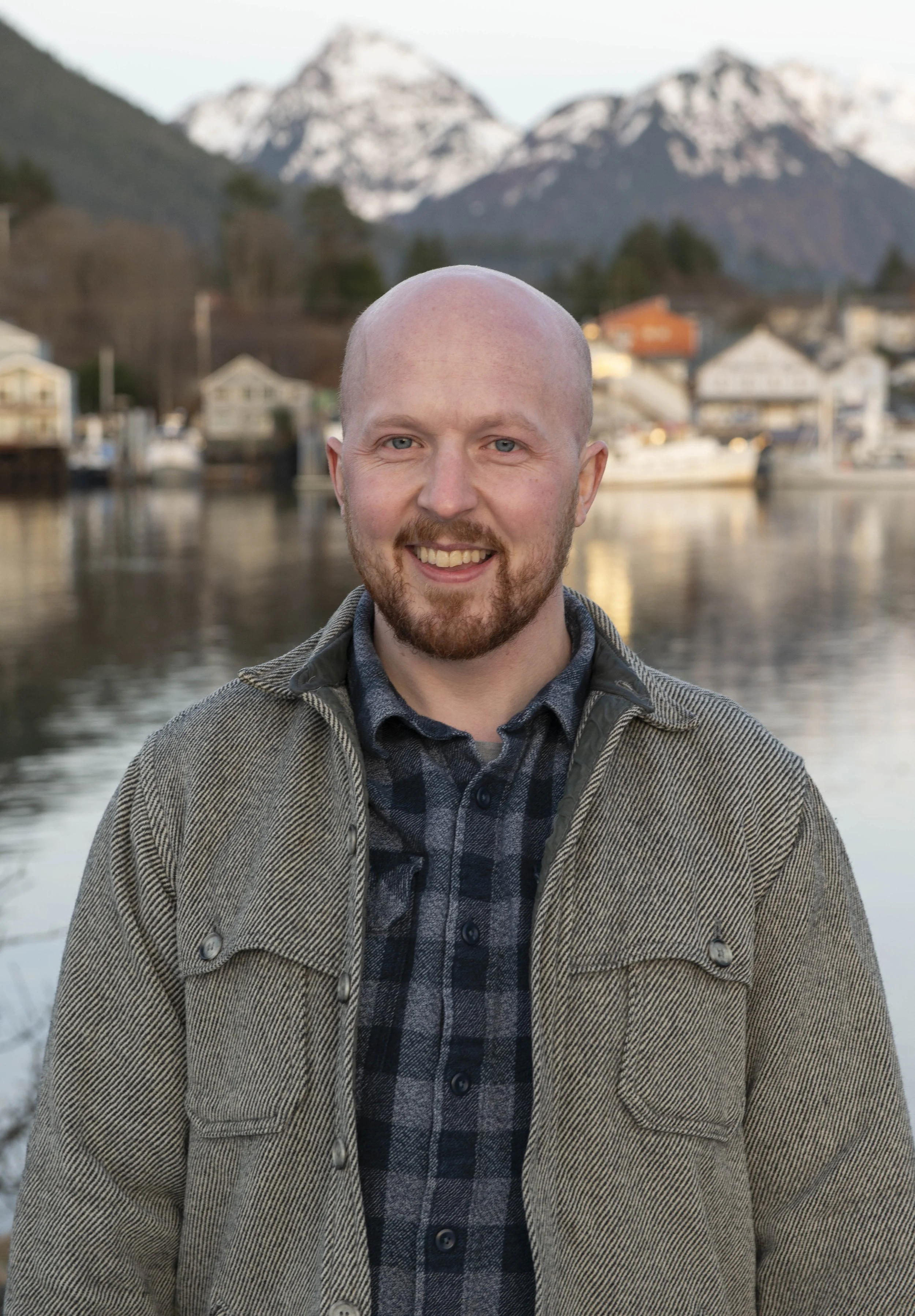 JKT standing outdoors with Sitka, Alaska in the background.