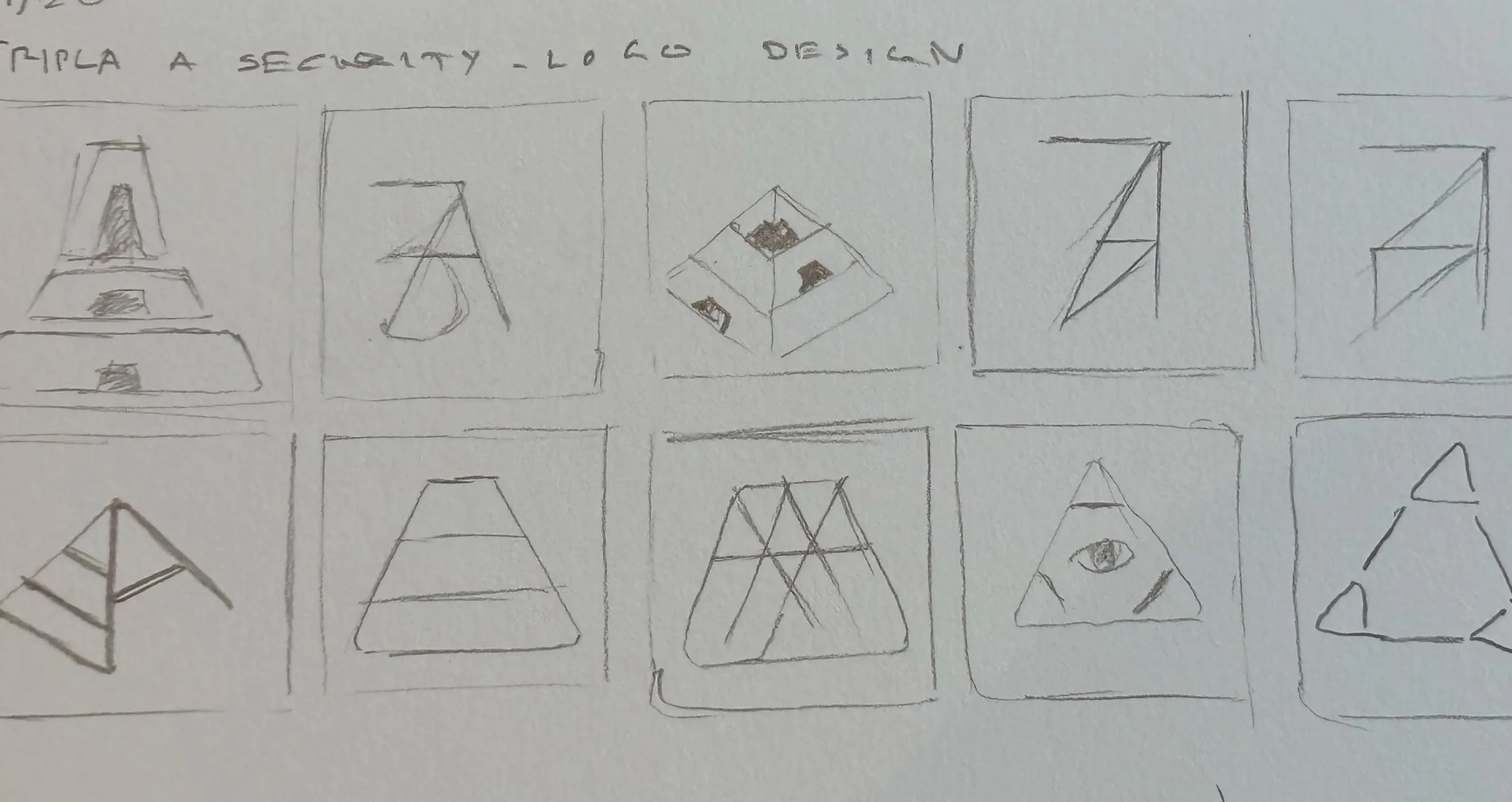 Hand-drawn sketches of various geometric pyramid designs, some with shaded or detailed sections and others with abstract lines.