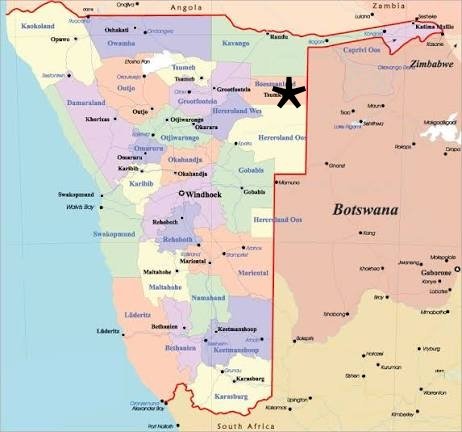 A map of Botswana, showing its neighboring countries Angola, Zambia, Zimbabwe, and South Africa. It also includes regional divisions, towns, and borders within Botswana, with an arrow pointing to a specific location.
