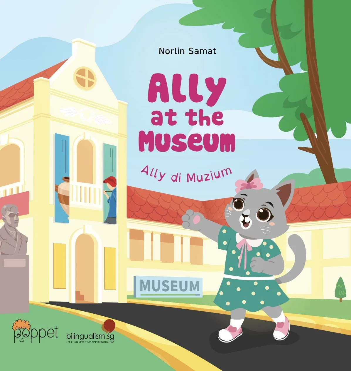 Illustrated cover of a children's book titled 'Ally at the Museum' by Norlin Samat, featuring a gray cat mascot with a pink bow, green polka dot dress, and pink shoes, standing in front of a museum building with a bust sculpture and large statue, trees, and balloons, in a colorful cartoon style.