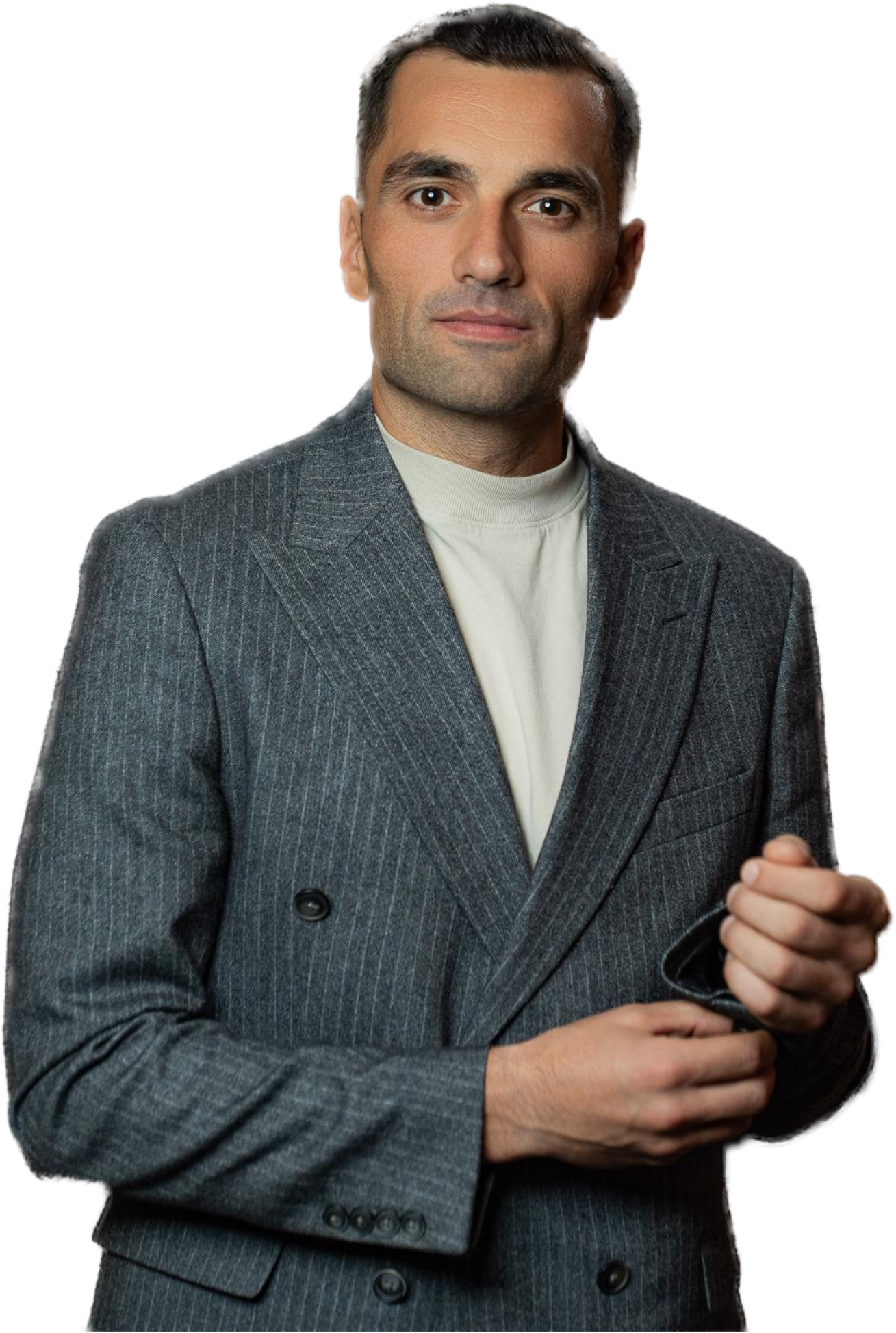 Ursu Iulian în costum, antreprenor și fondator Trade Grader, prezentând experiența sa în business și trading, în contextul secțiunii despre succes și libertate pe homepage-ul site-ului.