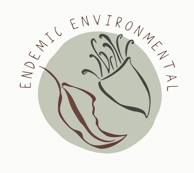 Logo featuring a stylized flower with the words 'Environmental' and 'Environmental' curved around it.