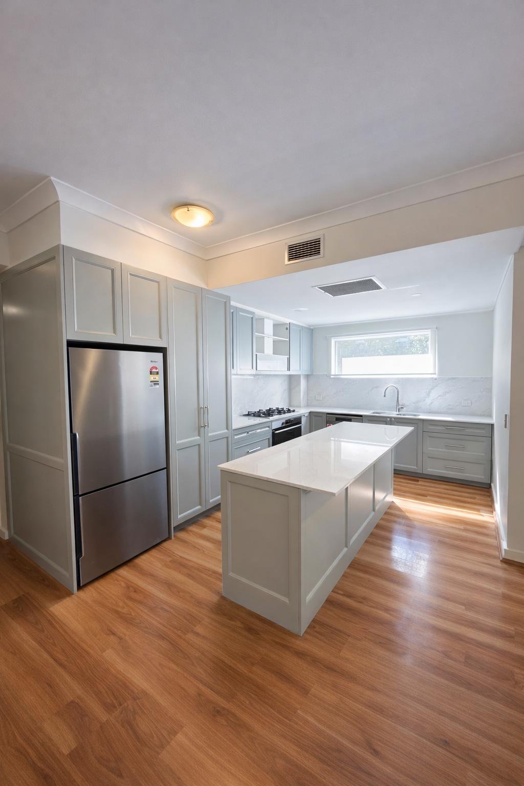 Full kitchen renovation and floor repairs to match old floor