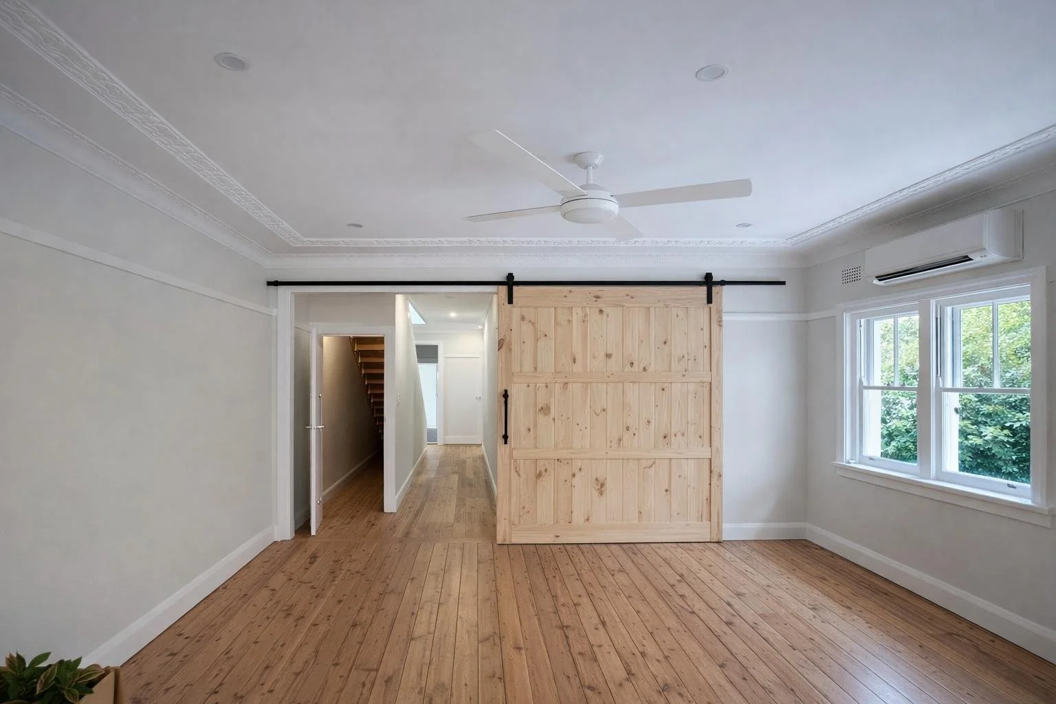 Under stair storage, burn door install and floor repair to match old floor