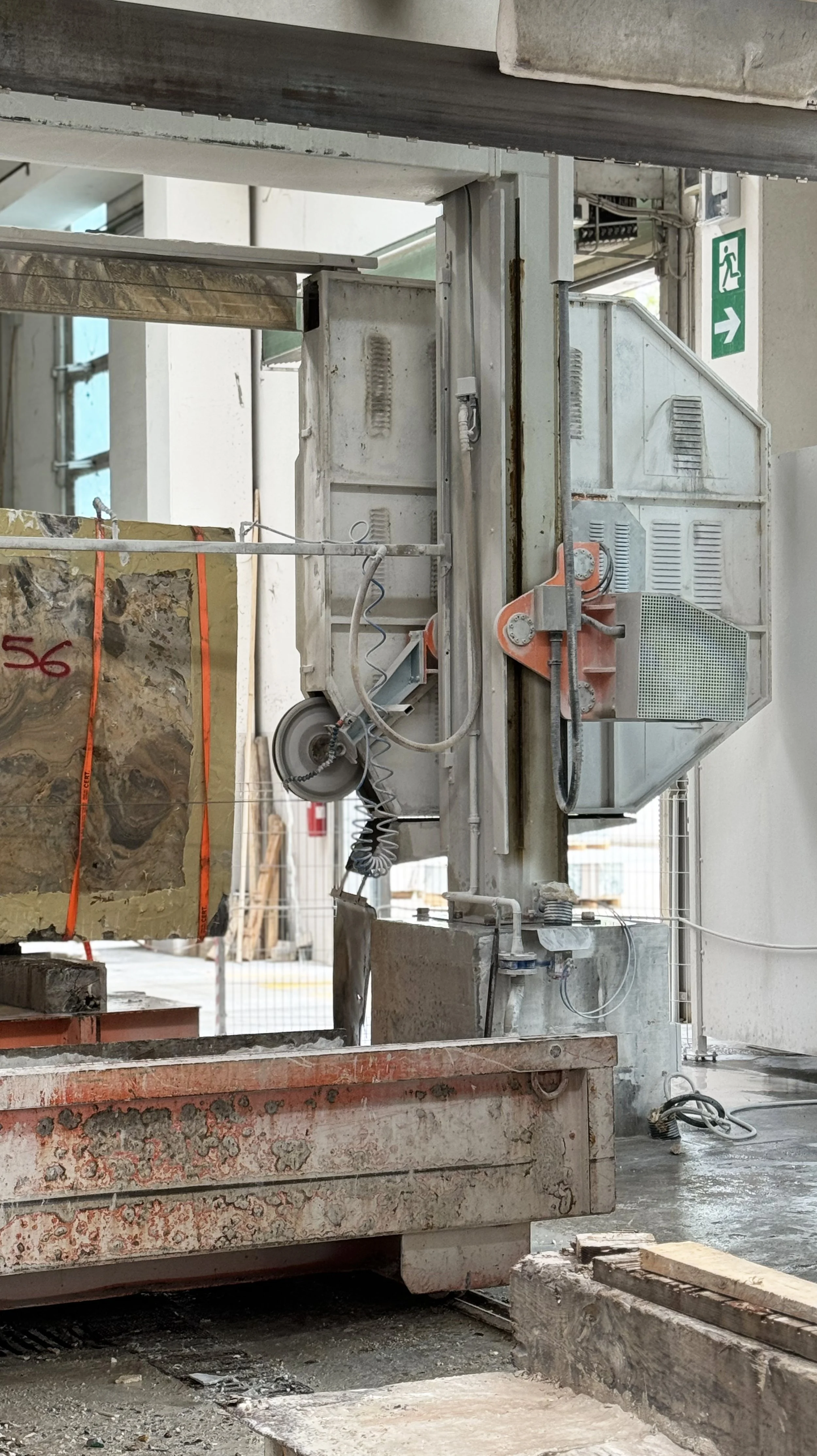 Industrial stone cutting machine in a construction site.