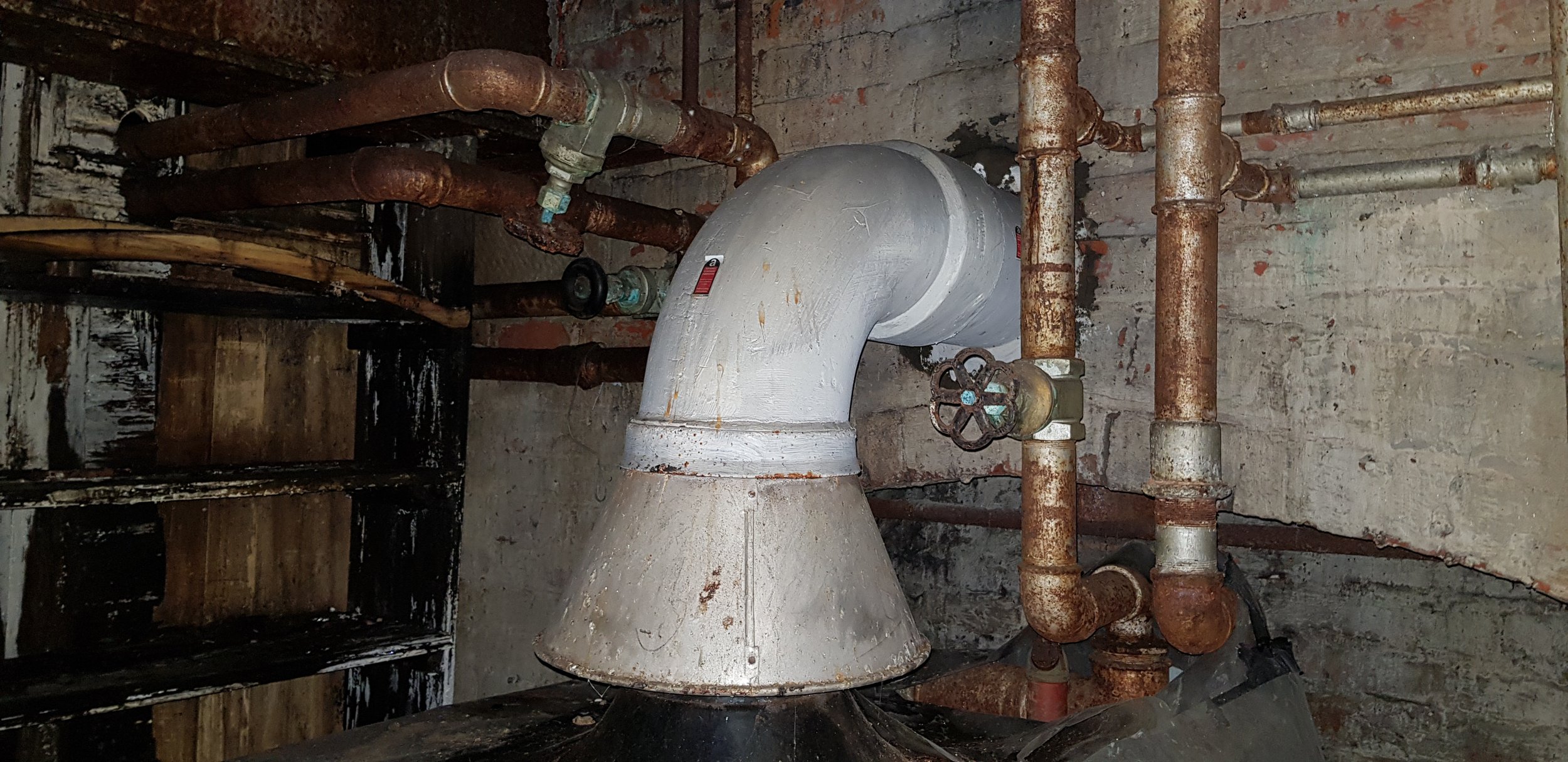 Older asbestos cement boiler flue