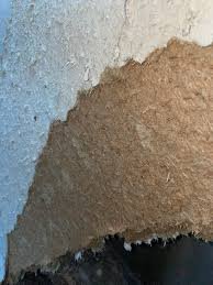 Paper asbestos lining to fibre board