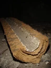 Asbestos paper lining to pipe work