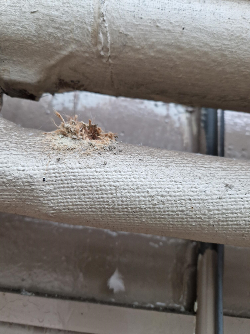 Asbestos textile to pipe run