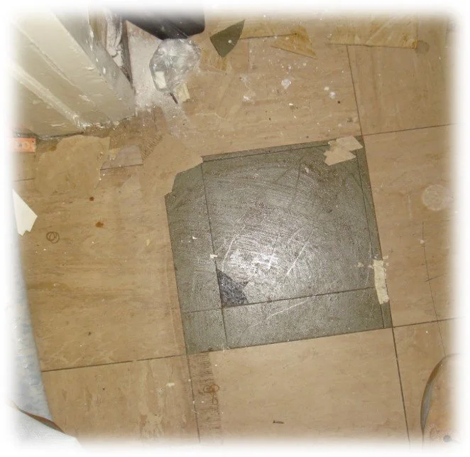 Asbestos floor tiles and bitumen adhesive requiring survey and sampling