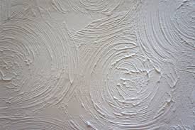 ASM photograph of an asbestos-containing textured coating requiring ongoing management