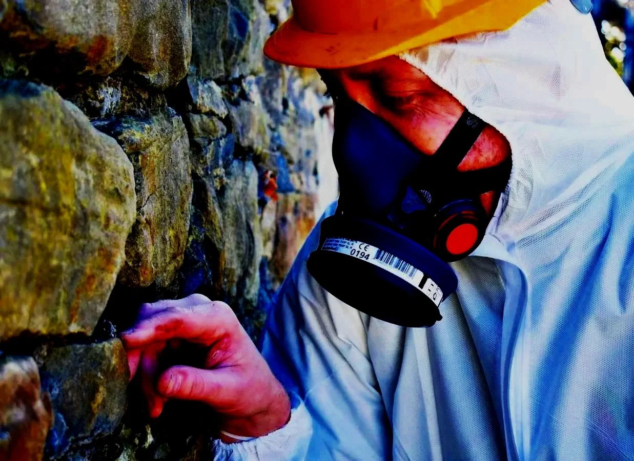 Asbestos surveyor inspecting a property before refurbishment work