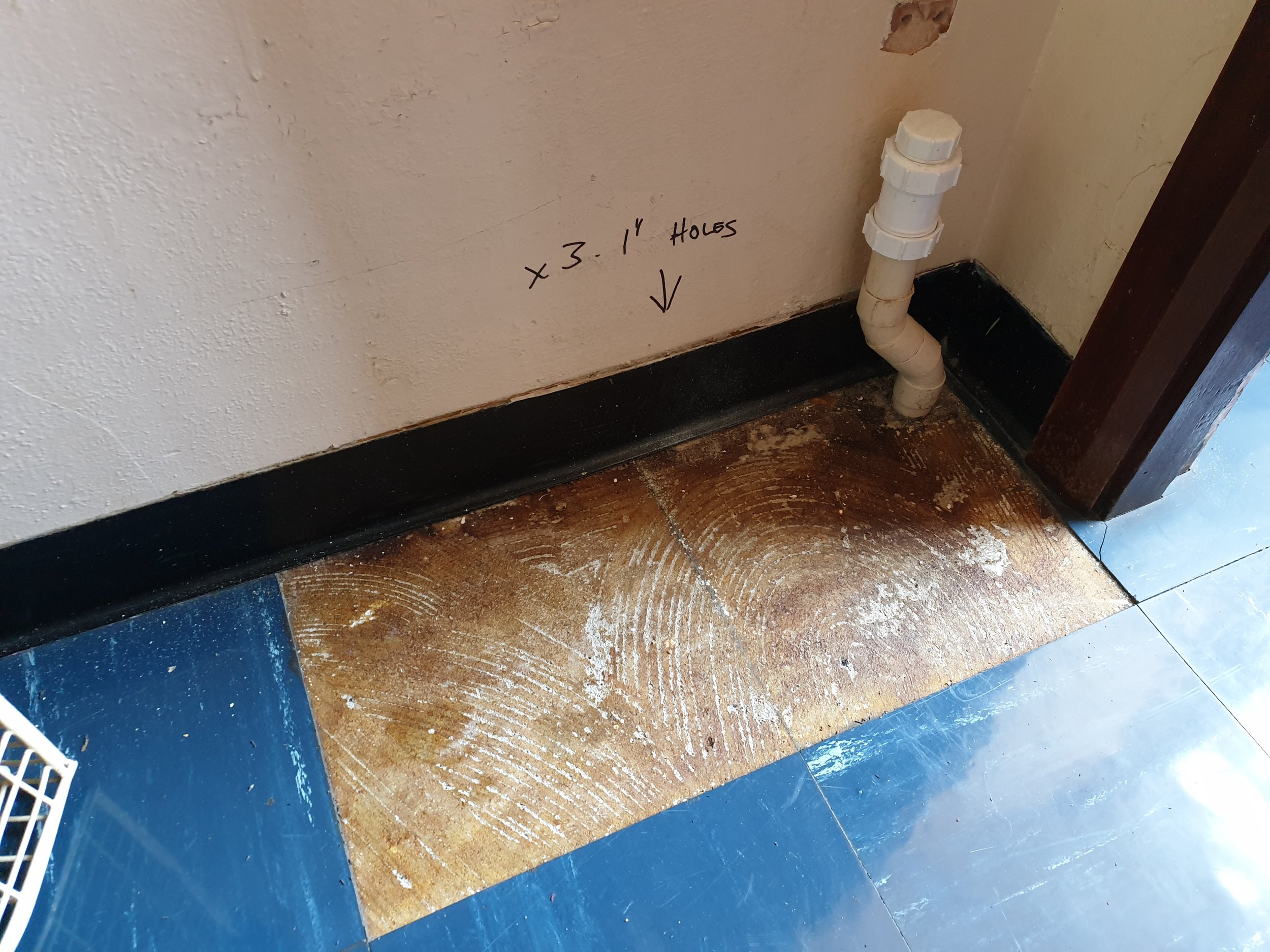 Older floor tiles and adhesive that may contain asbestos