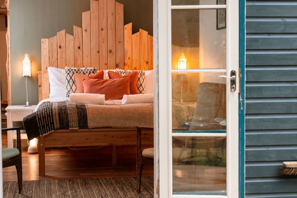 Kings size bed looks out to the stream