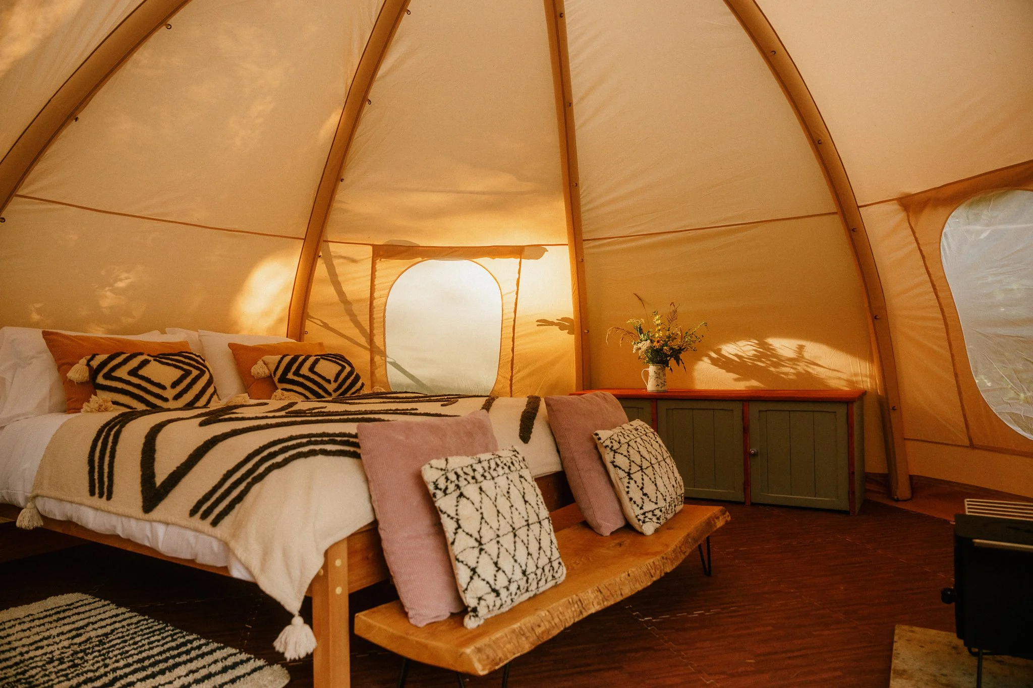 Huge kingsize bed inside a beautifully decorated, spacious dome tent 