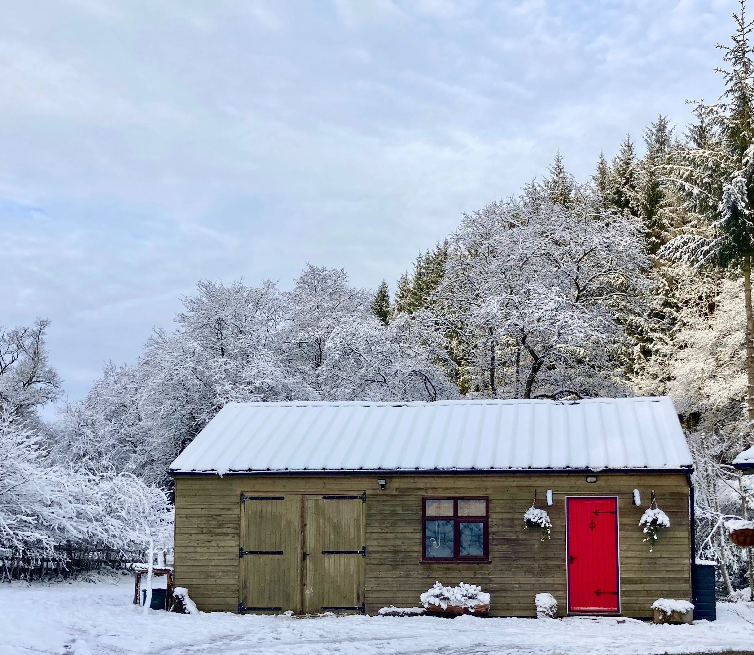 Snowy scene in Yorkshire cabin to rent