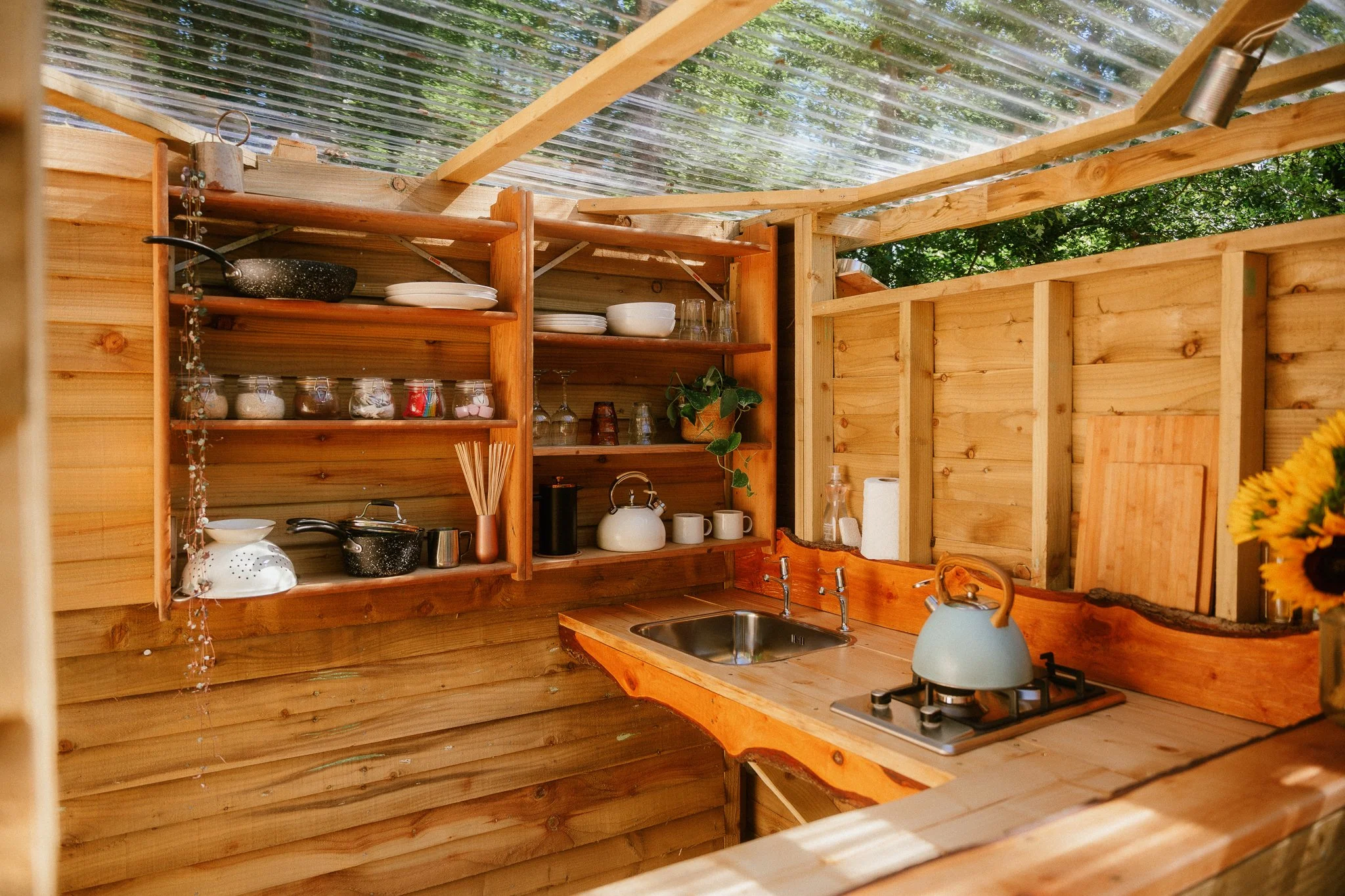 Beautifully crafted covered camping kitchen with excellent facilities 