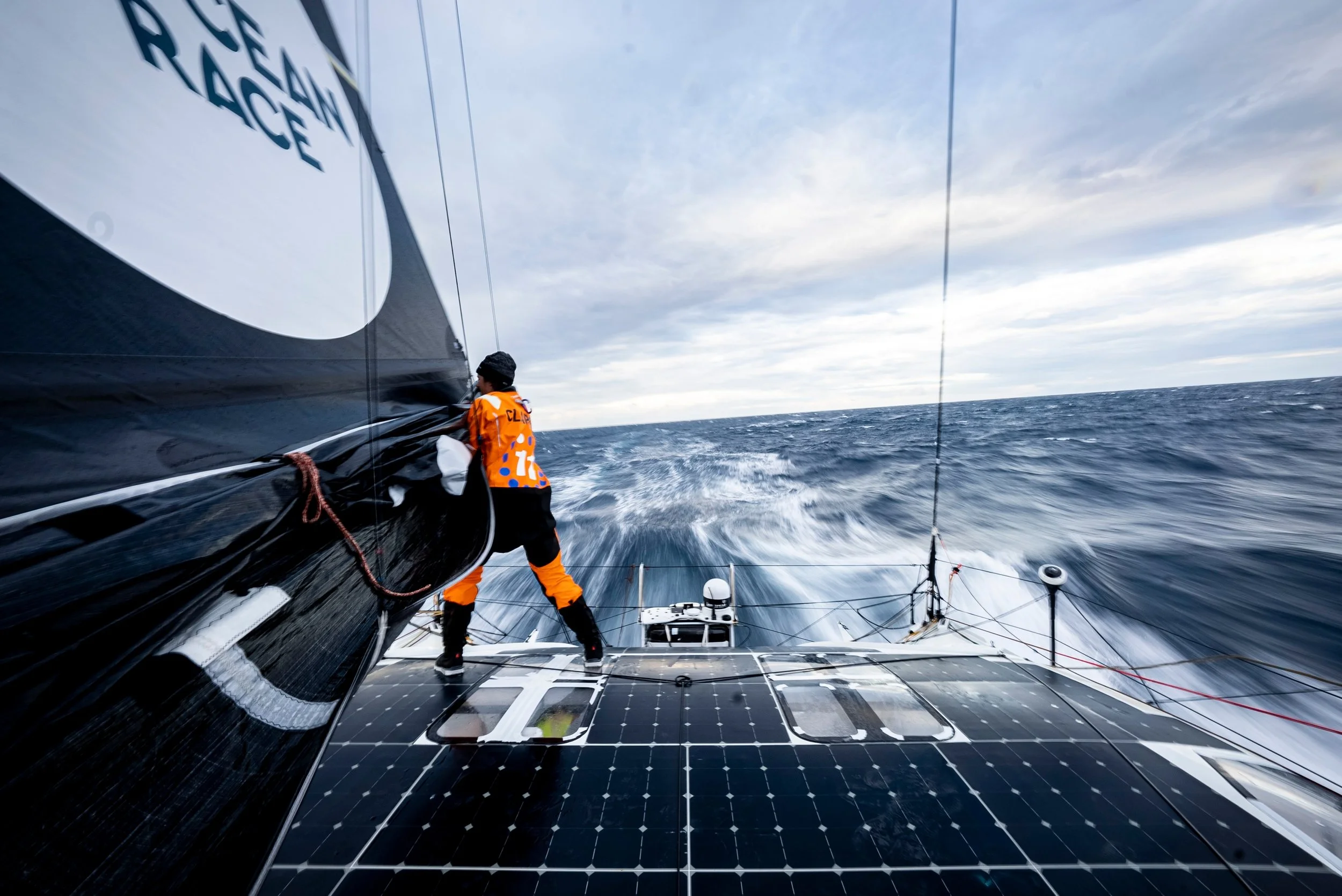 Francesca Clapcich on the deck of the IMOCA 11Th Hour Racing Team during The Ocean Race