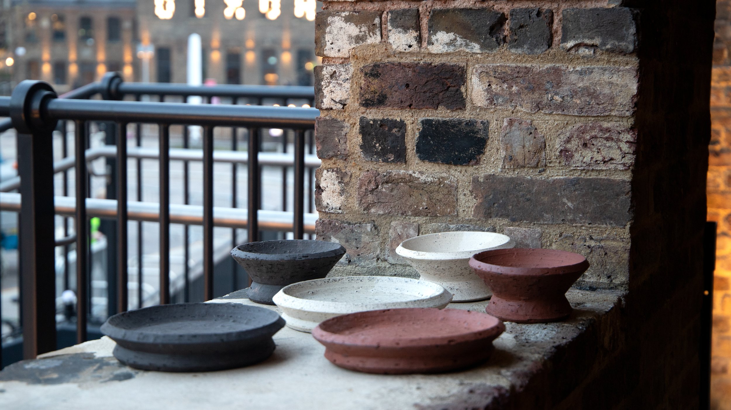 platesd and bowls sign in background.jpg