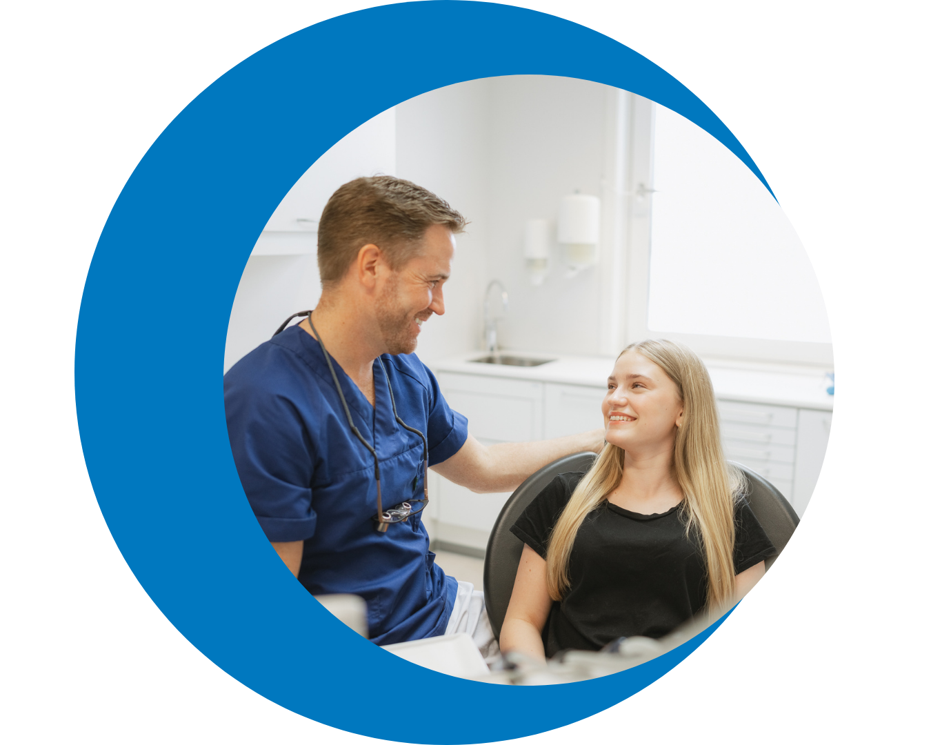 Clinician and adult patient using the Grasp coping device during treatment