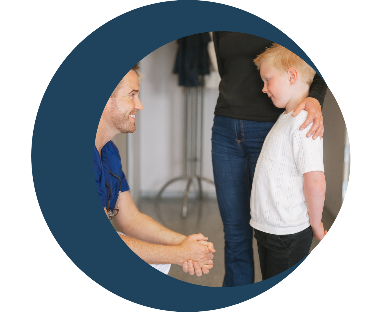 Child and clinician building trust during preventive care appointment