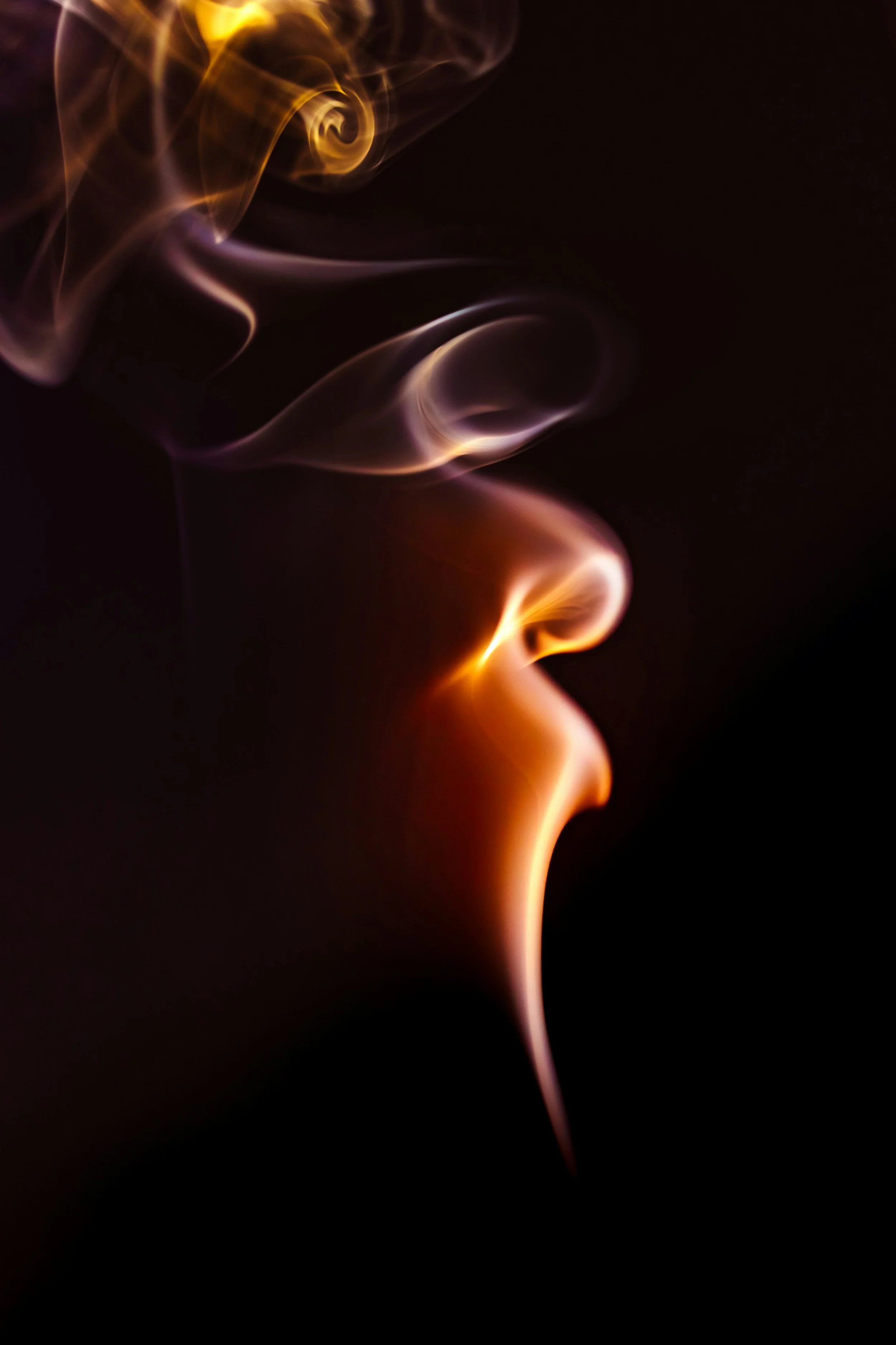 incense smoke in a dark setting during a deep transformation retreat for entrepreneurs