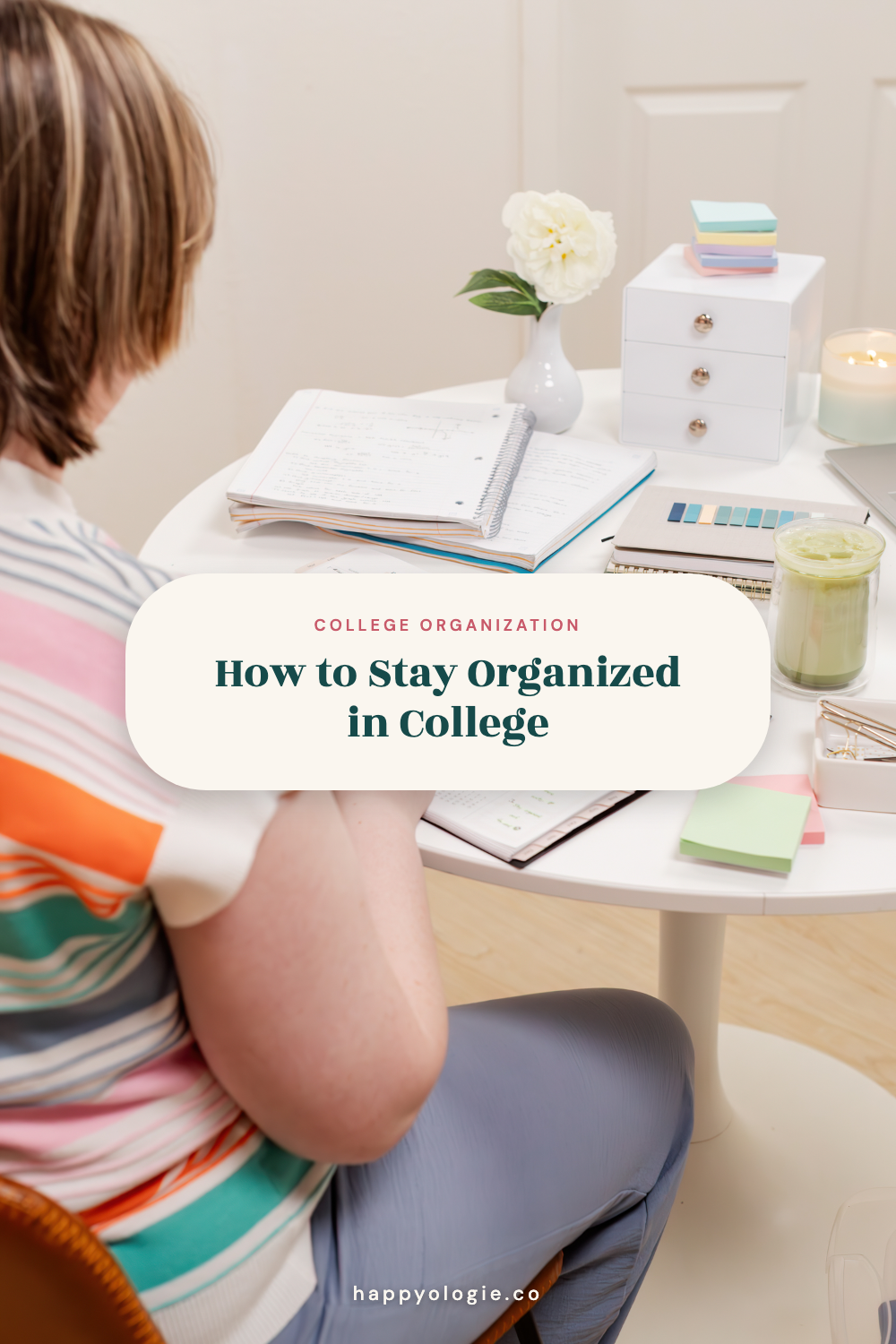 How to Stay Organized in College, shown over a student writing at a desk with notebooks and planning supplies.
