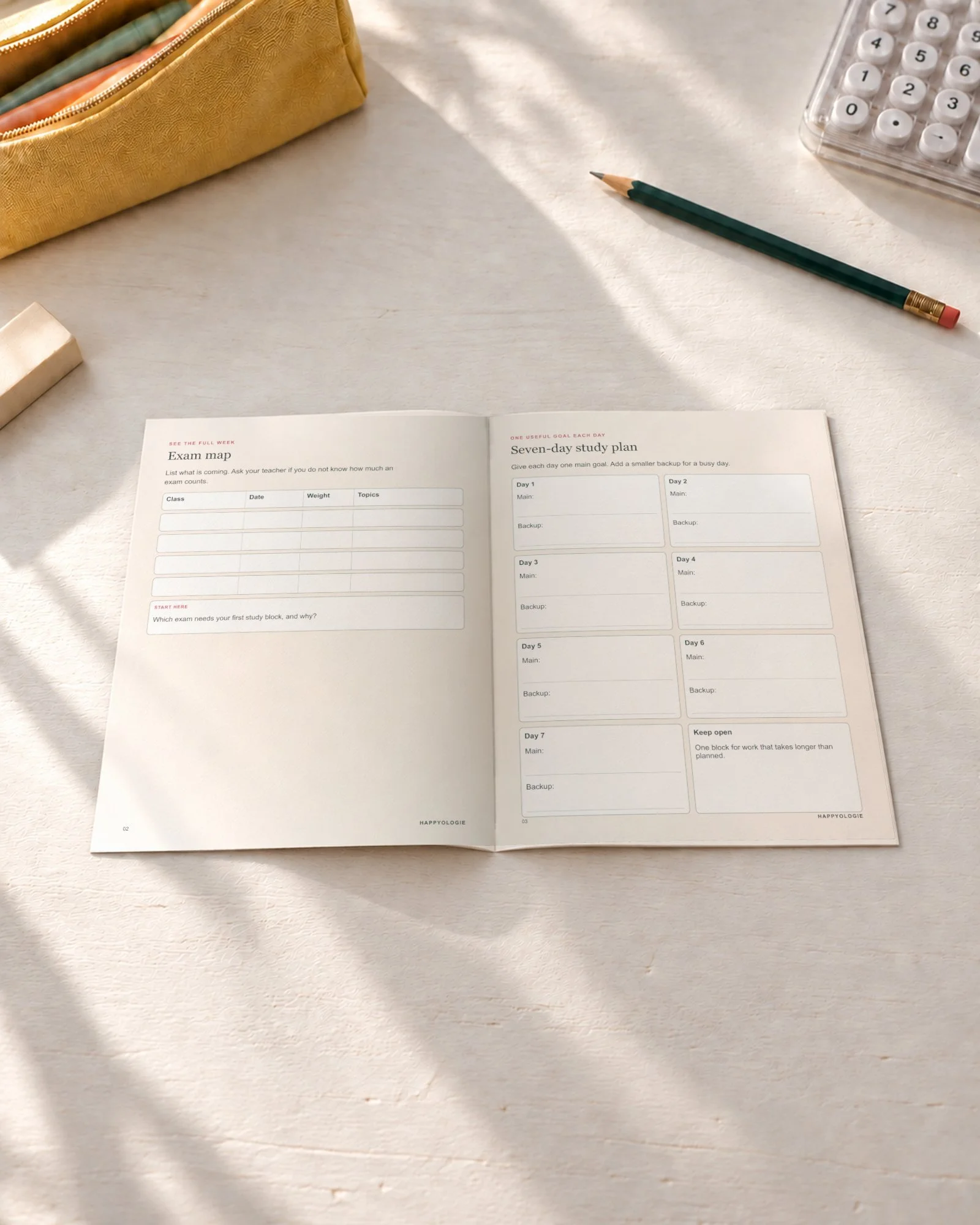 Exam map and seven-day study plan open on a white table.