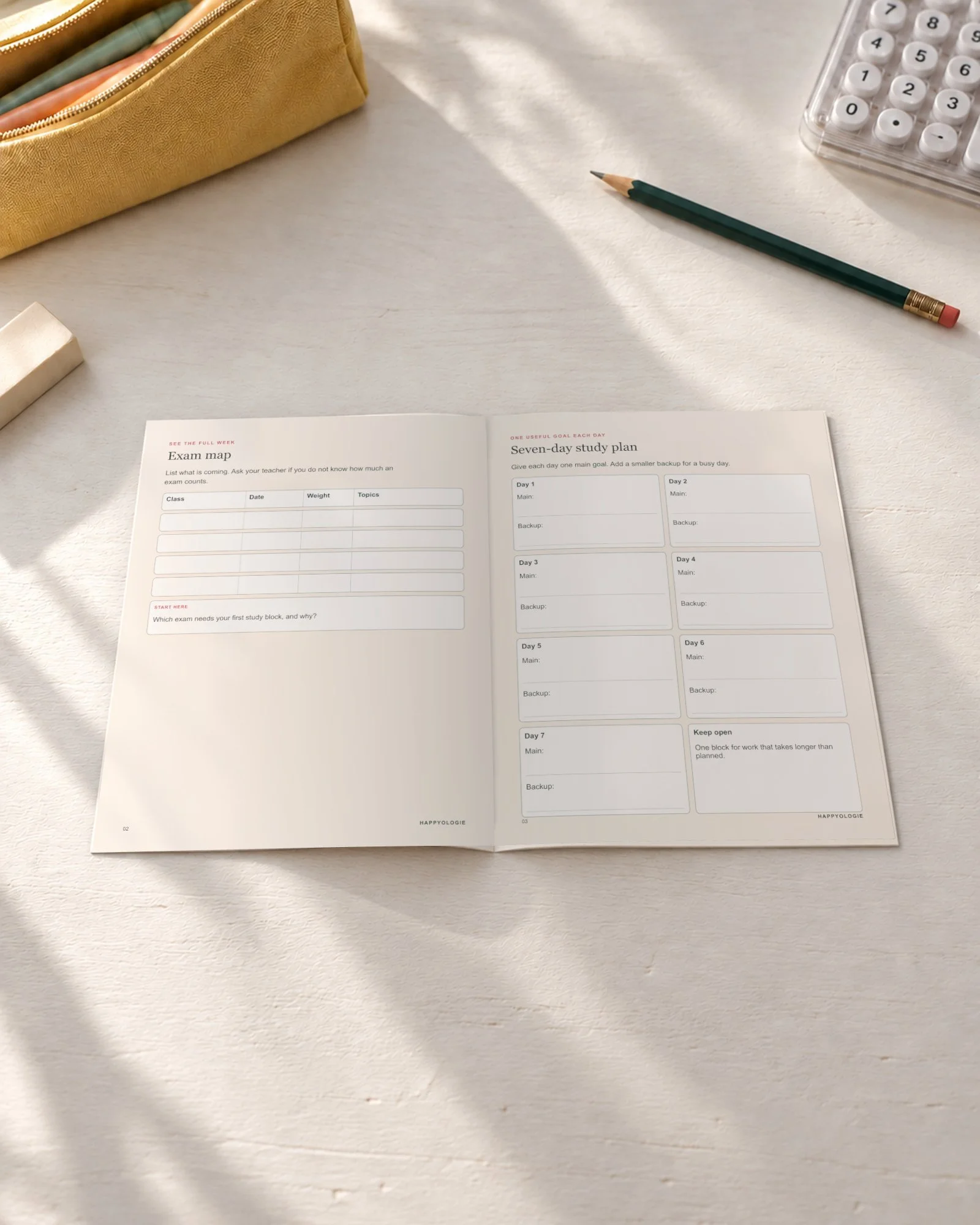 Exam map and seven-day study plan open on a white table.