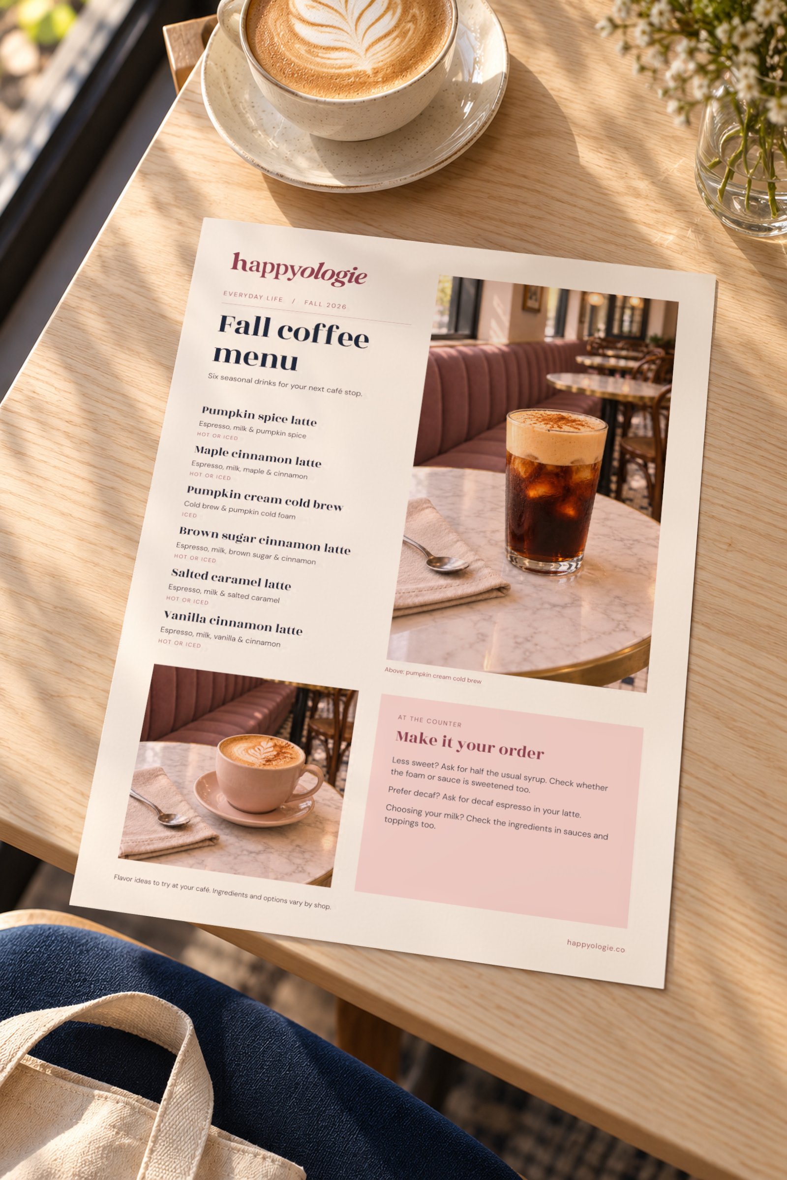 Happyologie Fall Coffee Menu printed on a café table beside a latte.