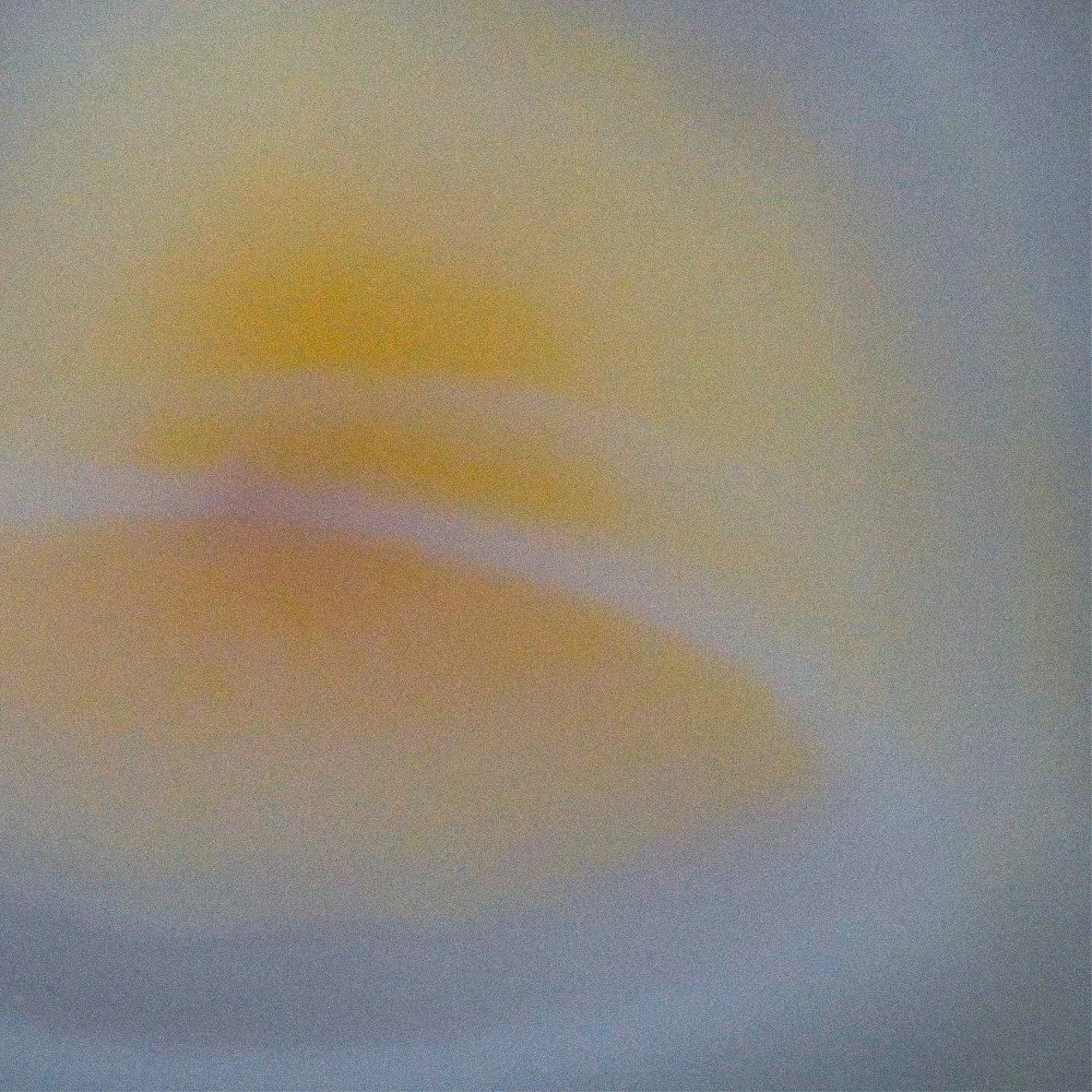 The image is blurry and abstract, making it difficult to identify any specific objects or scene.