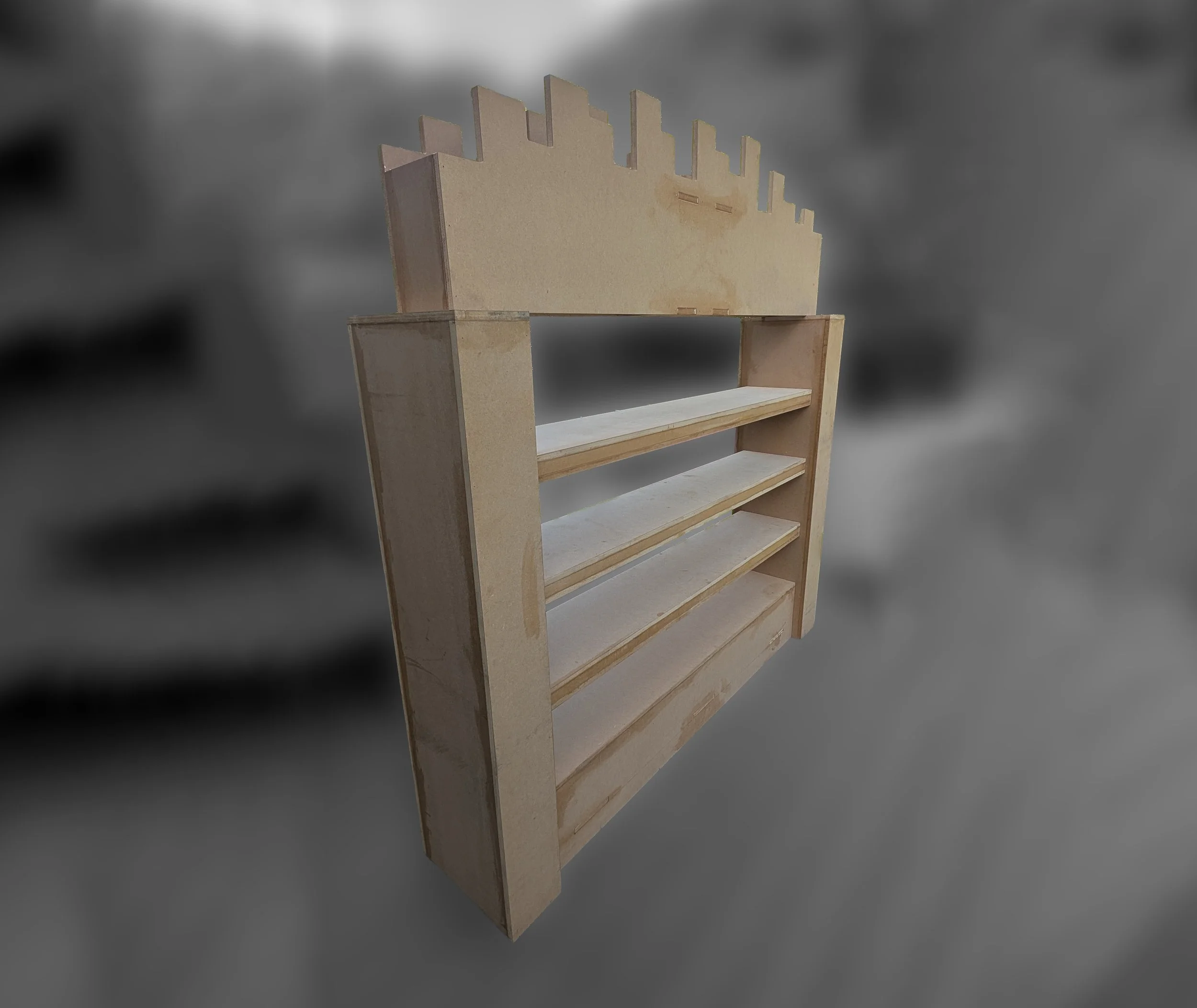 A wooden shelf with four tiers and an elevated back panel with a cut-out city skyline silhouette.