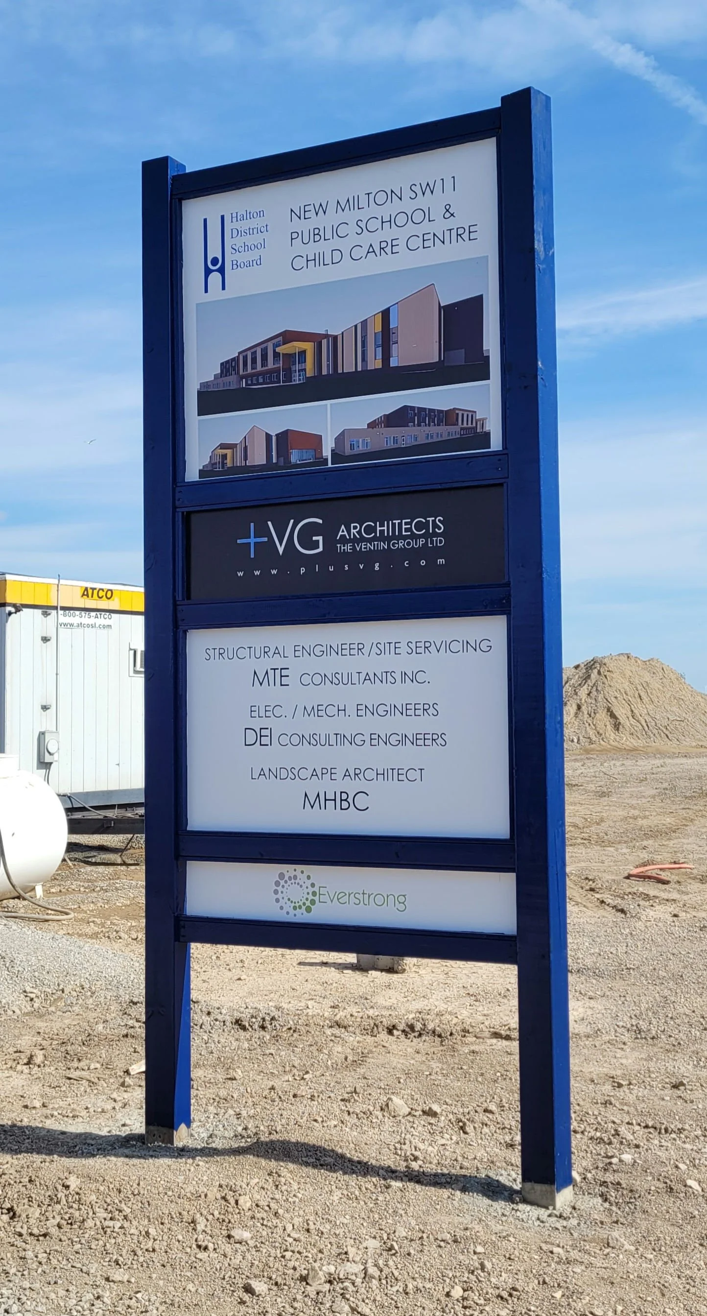 Signboard for New Milton SW11 Public School & Child Care Centre, designed by VG Architects, with information about various engineering consulting firms and Everstrong logo.