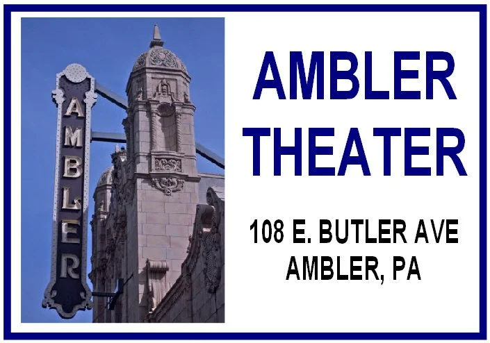 Sign for Ambler Theater at 108 E. Butler Ave in Ambler, PA, featuring a historic building with ornate architecture in the background.