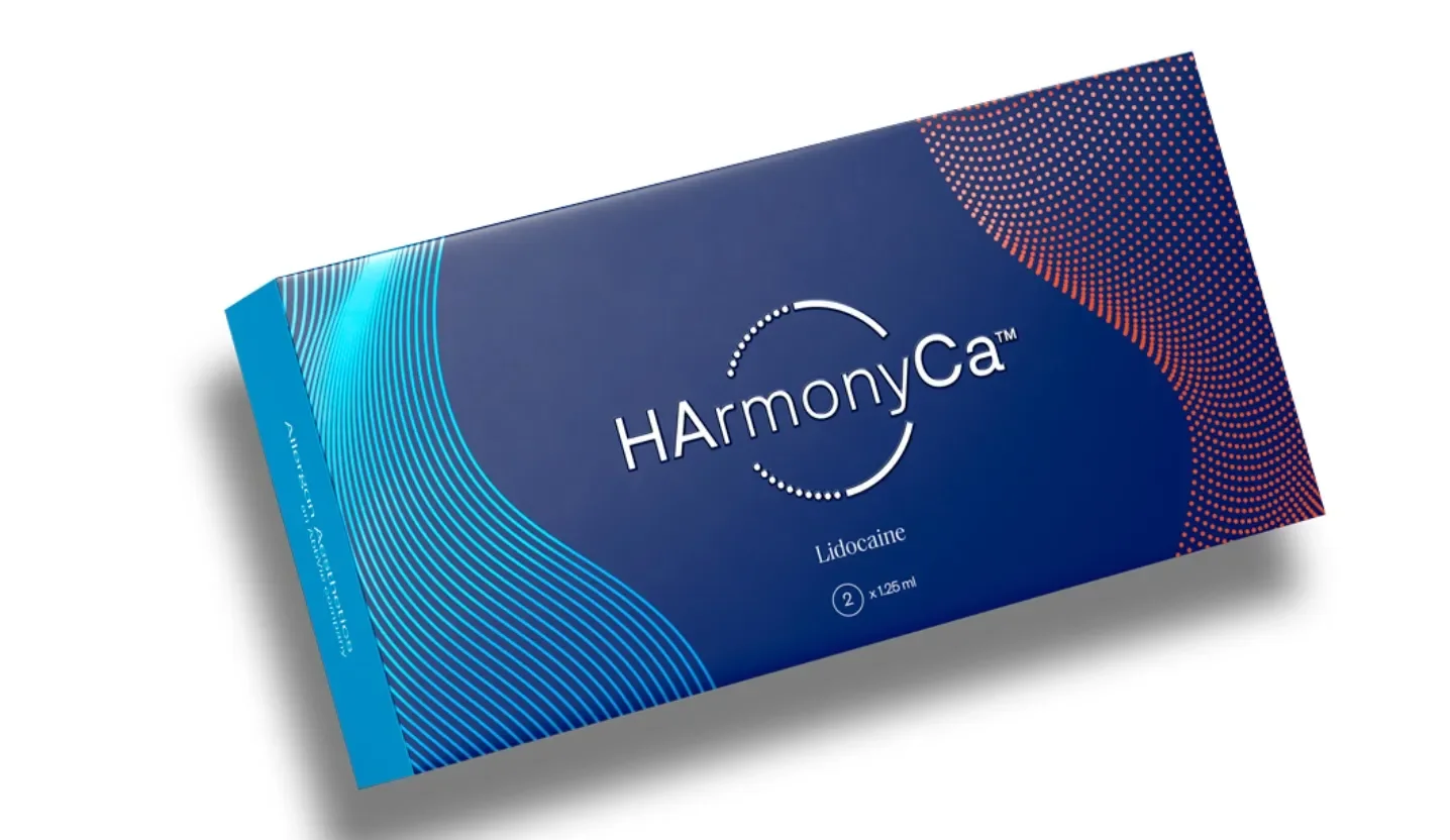Box of HArmonyCa Lidocaine medication with blue and red dotted design.