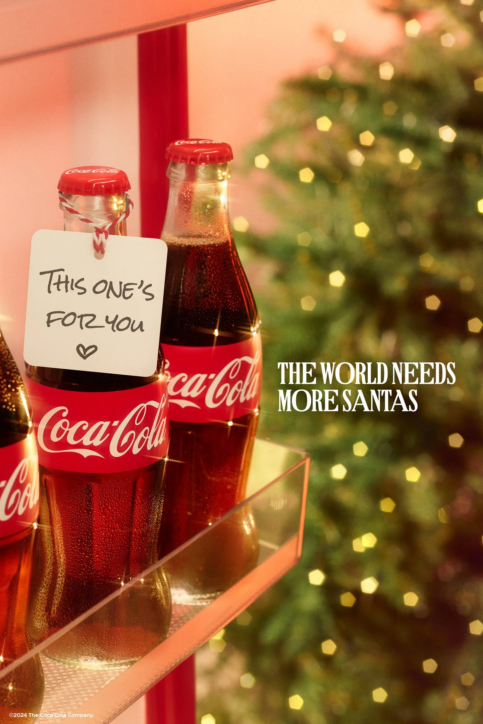 COCA COLA: THE WORLD NEEDS MORE SANTAS