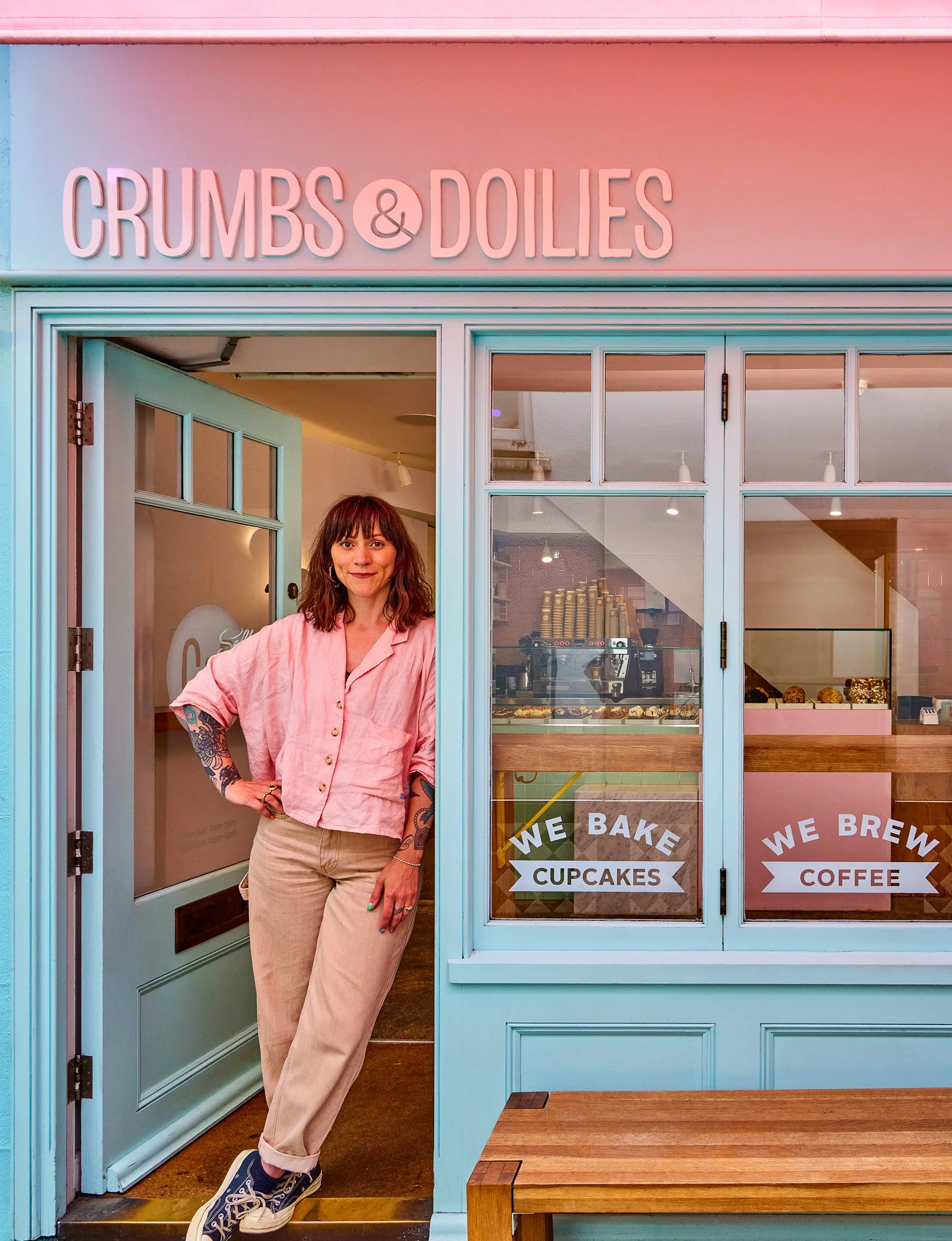 Cupcake Jemma outside crumbs and doilies shop photography for cookbook publishing