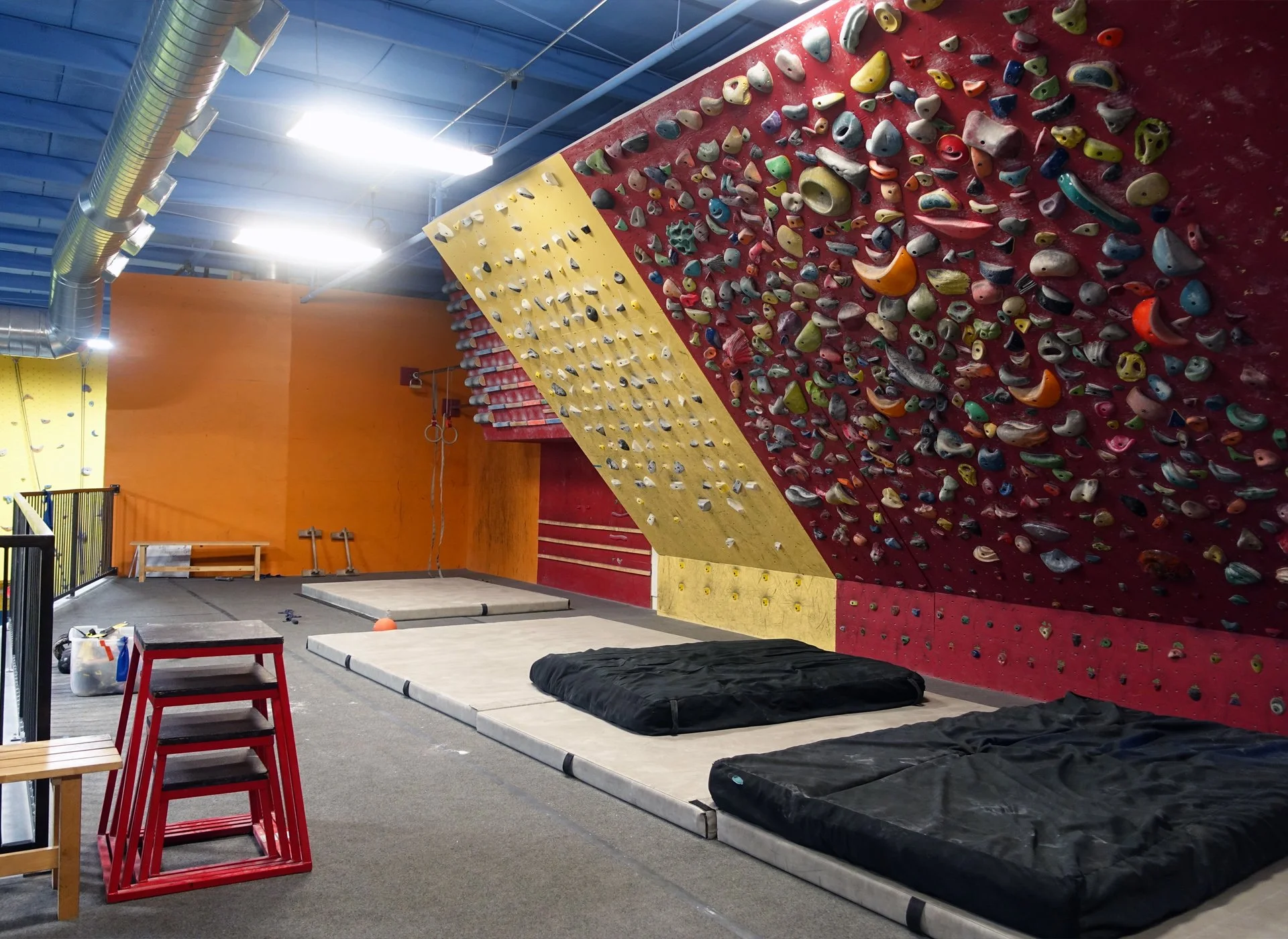 Climbing system boards and training area at Planet Rock Ann Arbor