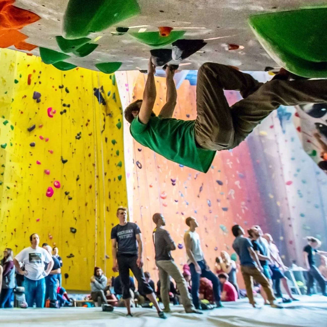 Climber climbing bouldering arch at Planet Rock