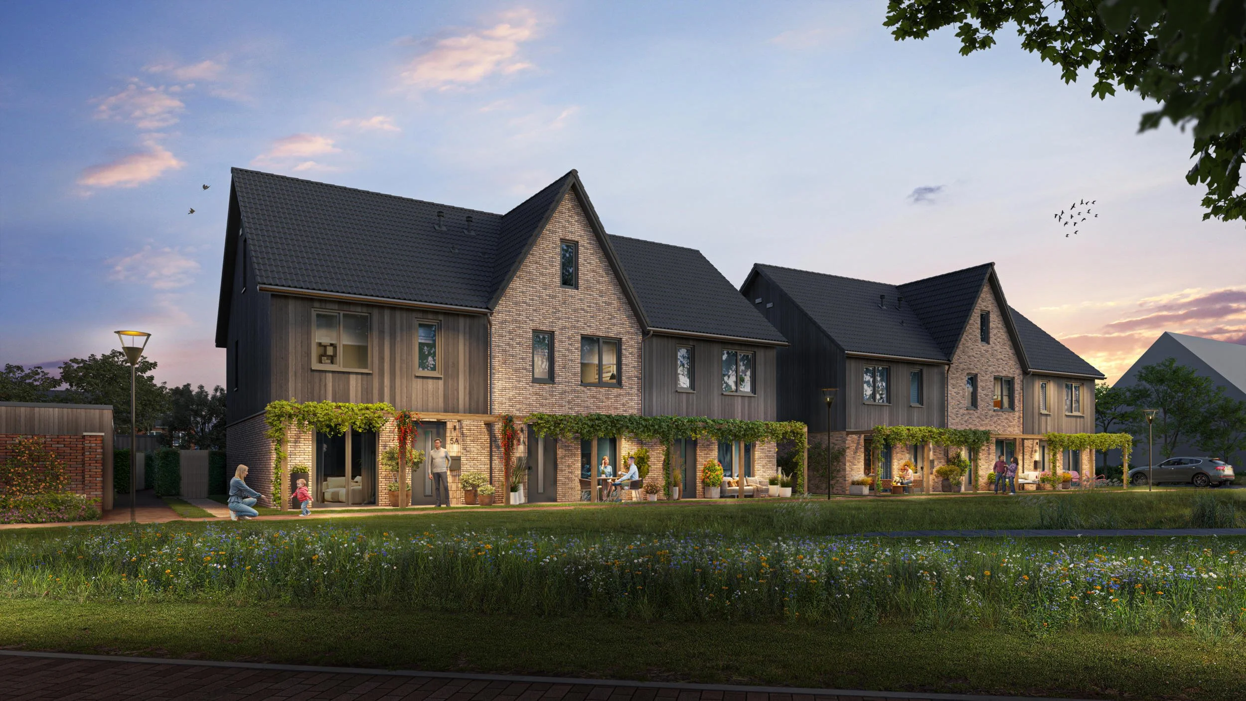 "Artist impression van duurzame gezinswoningen met een combinatie van houten gevelbekleding en robuust metselwerk in een parkachtige omgeving bij schemer.