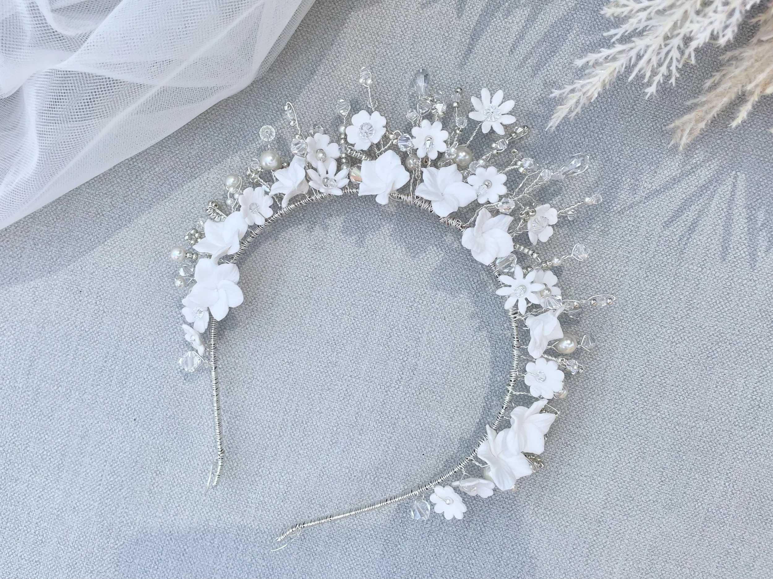 Modern bridal hair accessory with sculpted details and pearls by Jen Gilbert