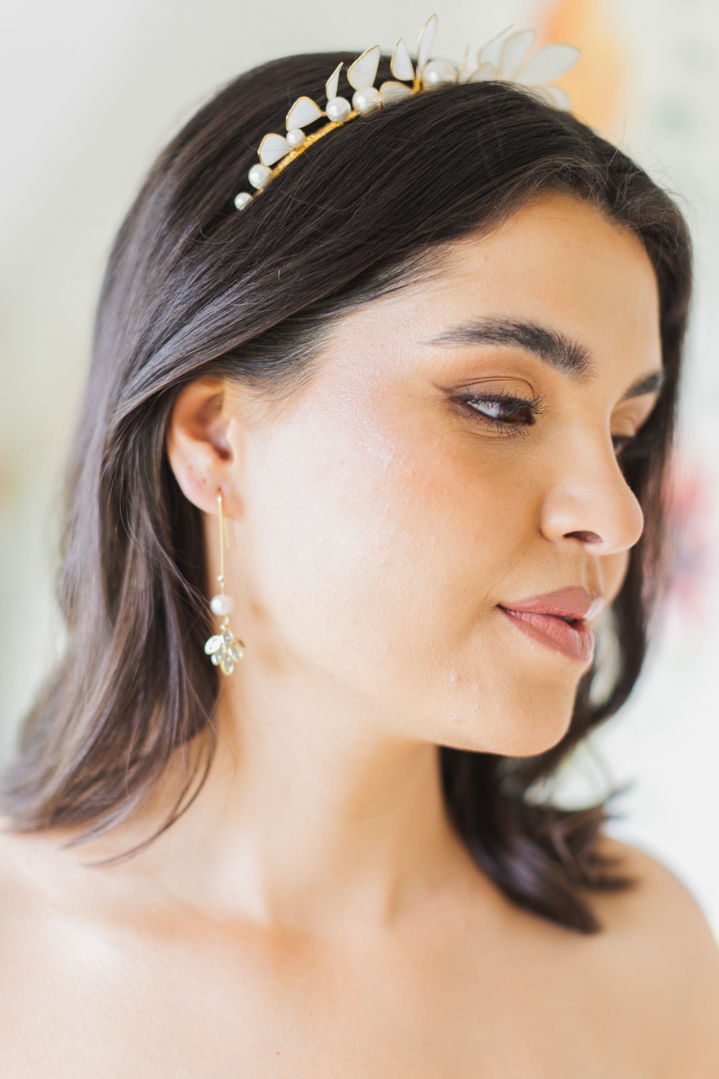 Modern bride wearing luxury bridal hair accessories and jewellery by UK designer Jen Gilbert