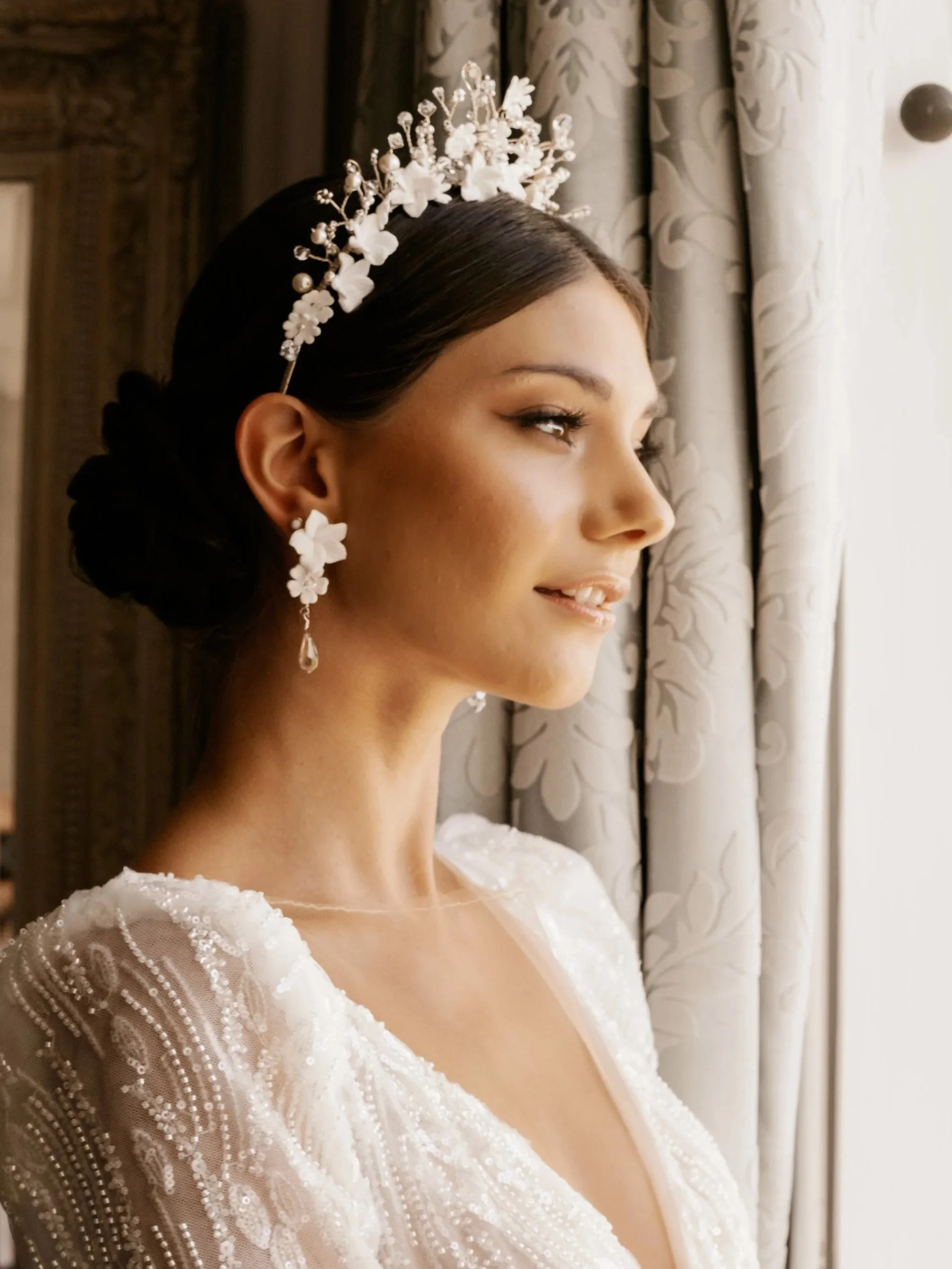 Bride wearing a handcrafted bridal crown and pearl jewellery by Jen Gilbert Couture Bridal Accessories