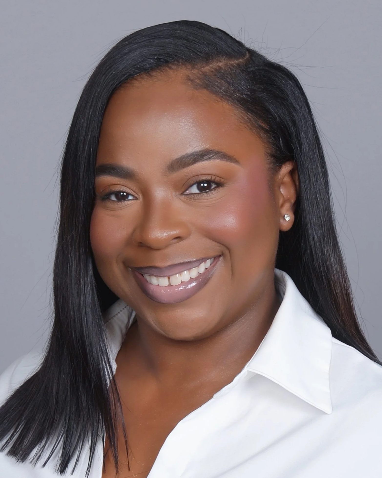 Aaliyah, licensed esthetician providing customized facial treatments in Phoenix, AZ